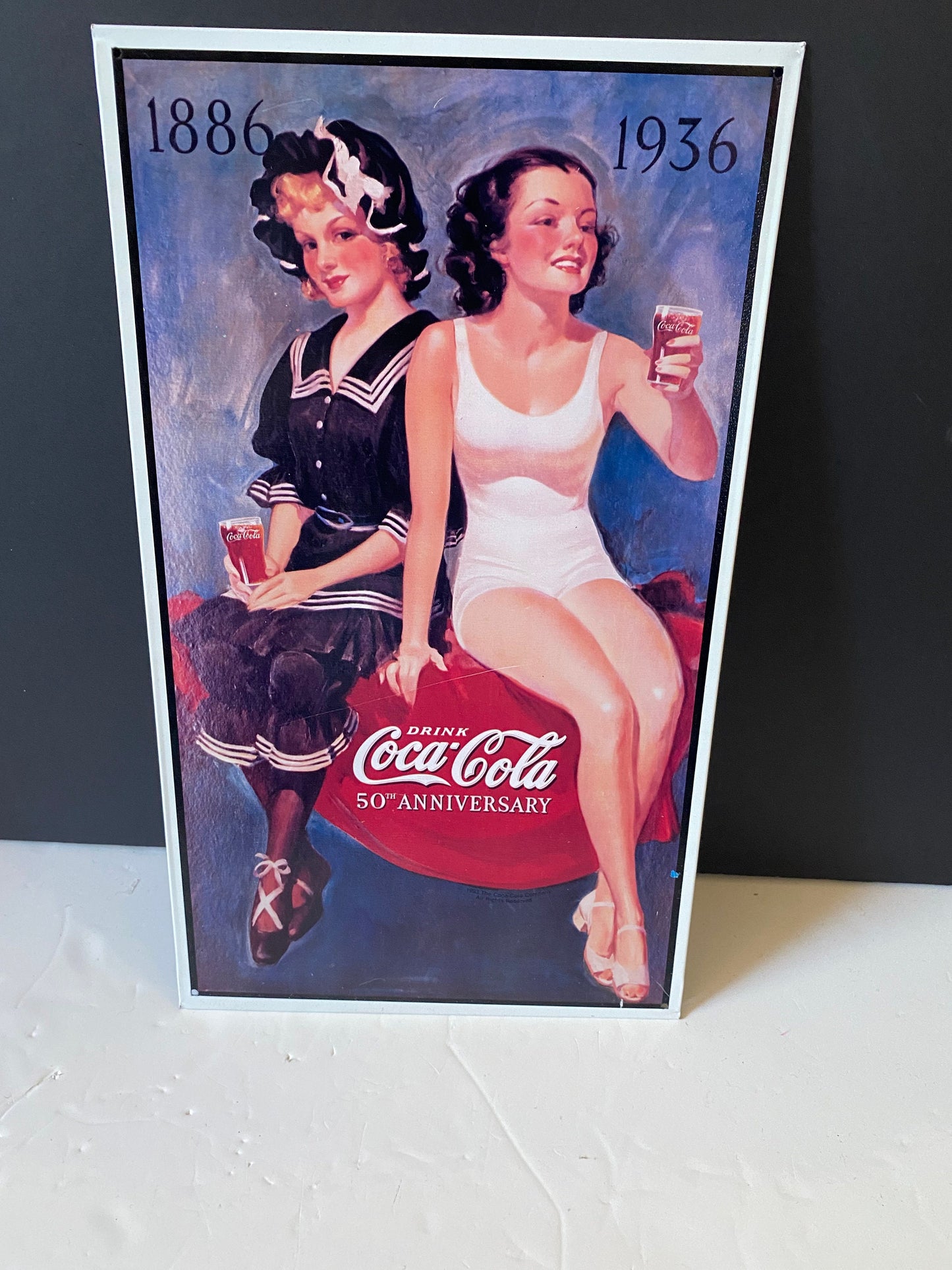 Vintage tin coke sign advertising