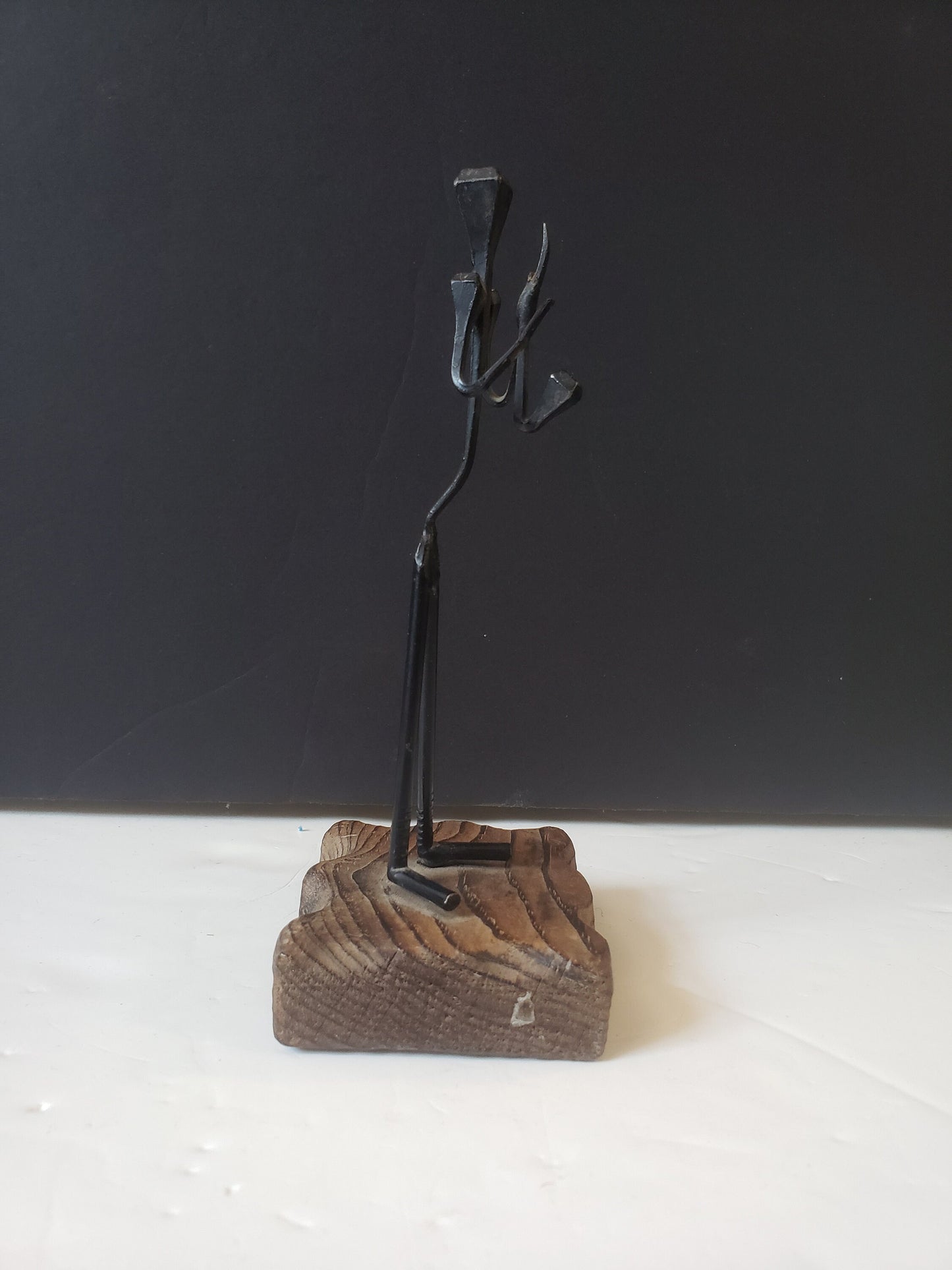Cast Metal Saxophone Player on Wood Stand