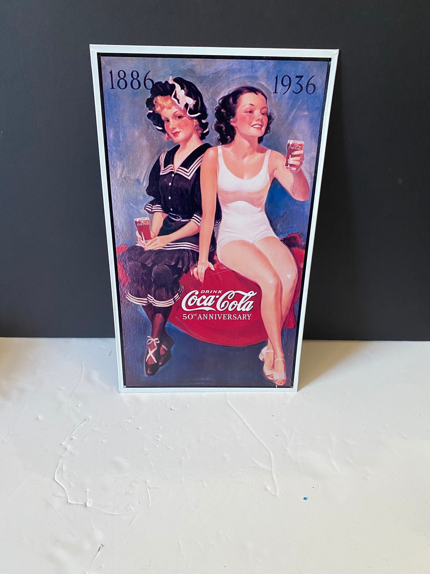 Vintage tin coke sign advertising