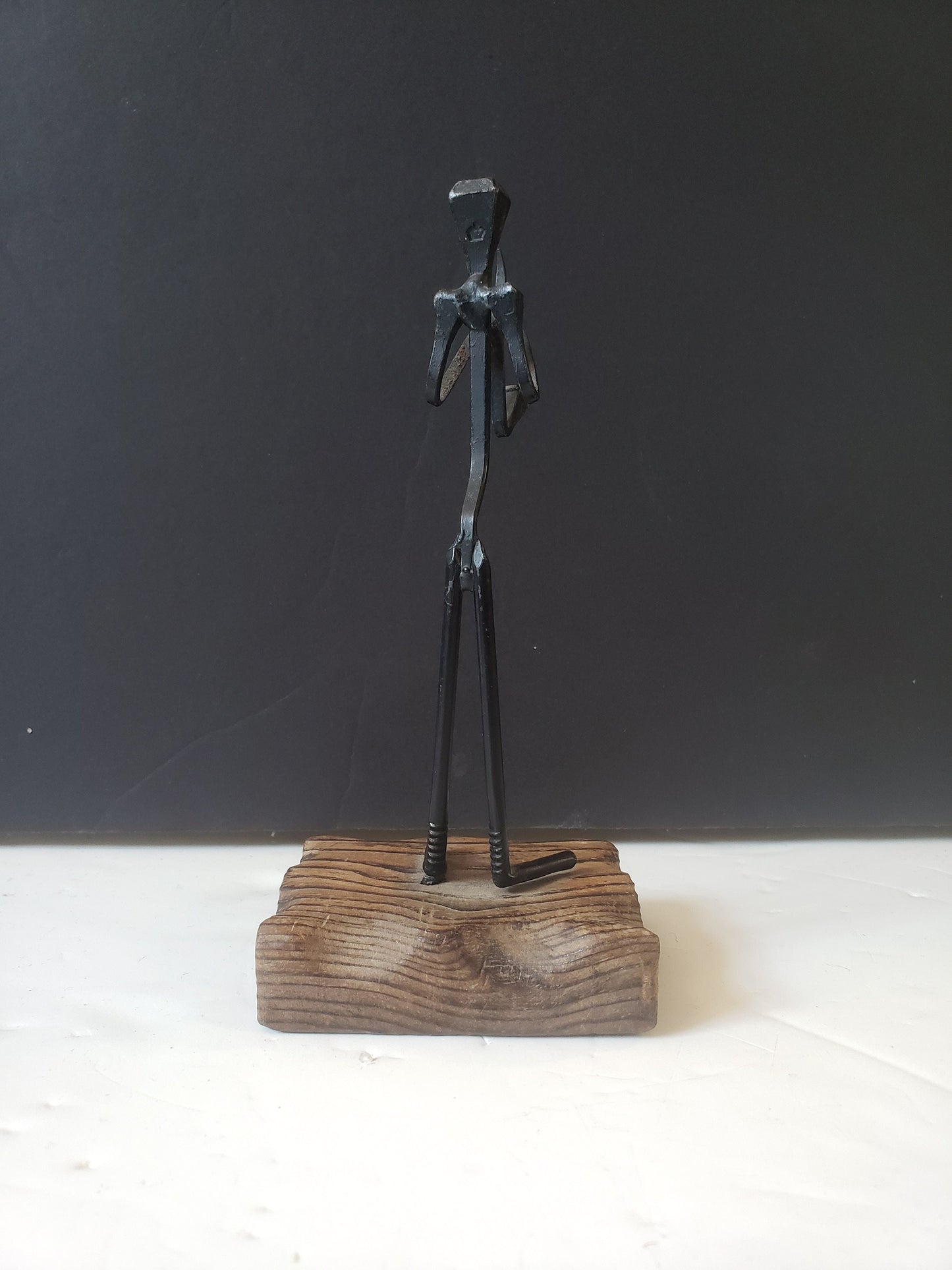 Cast Metal Saxophone Player on Wood Stand
