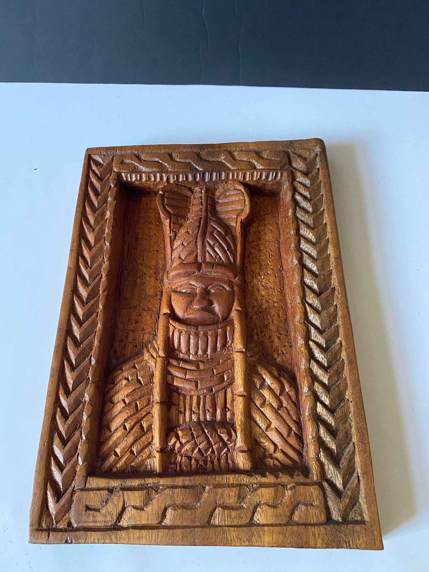 15 inch western African carved wooden plaque of a tribal chief