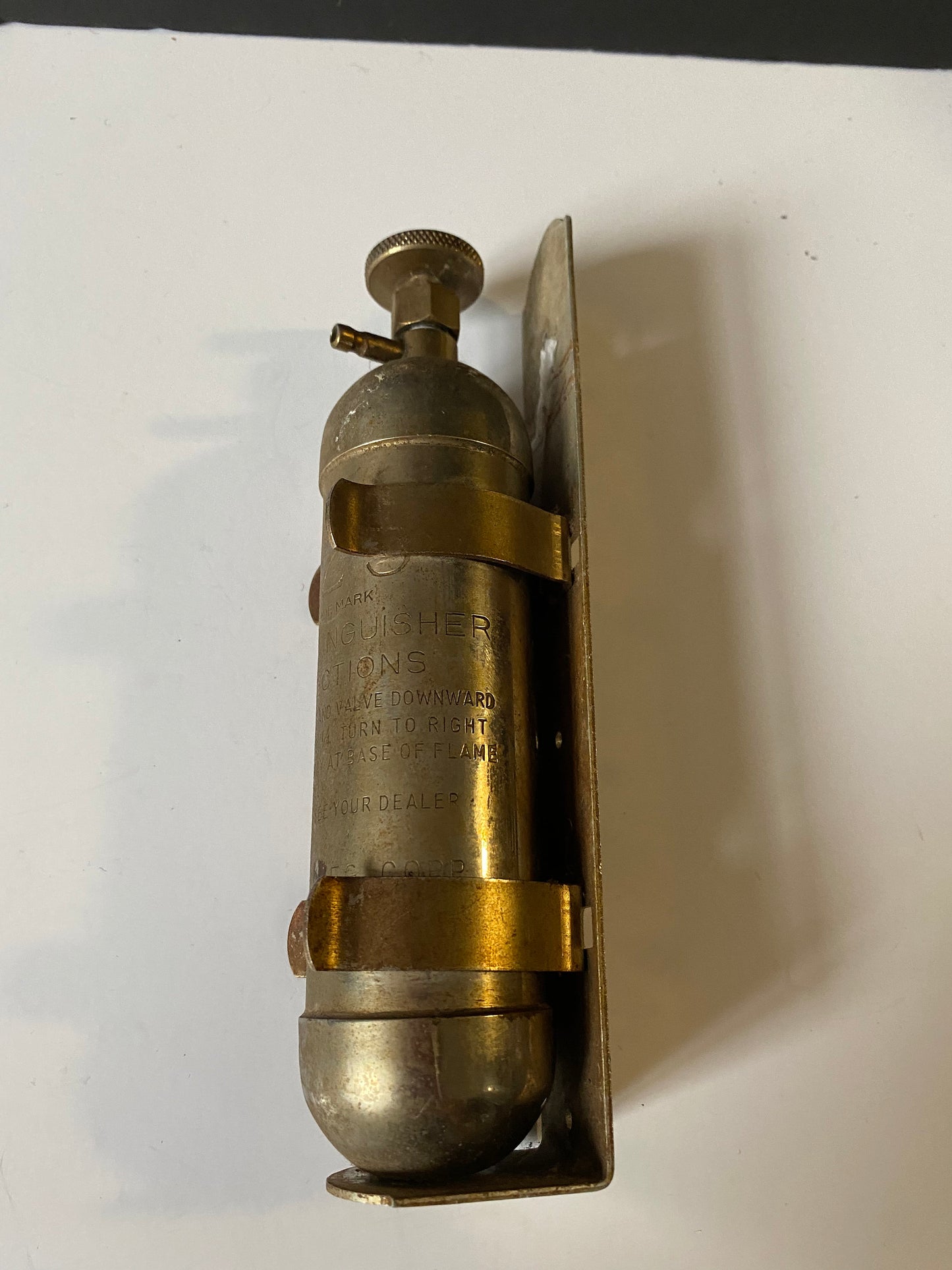 A 8 inch salesman sample fire Extinguisher with bracket very old very cool Philadelphia