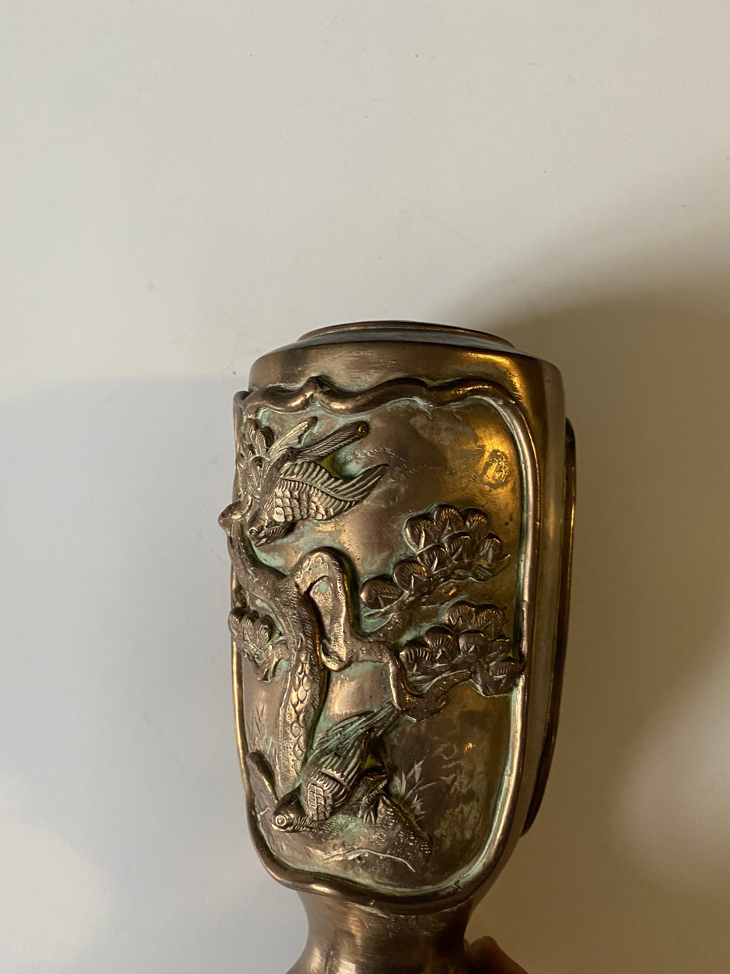 A 9 inch heavy bronze Chinese vase depicting birds on branches Approximately 500 g stunning patina