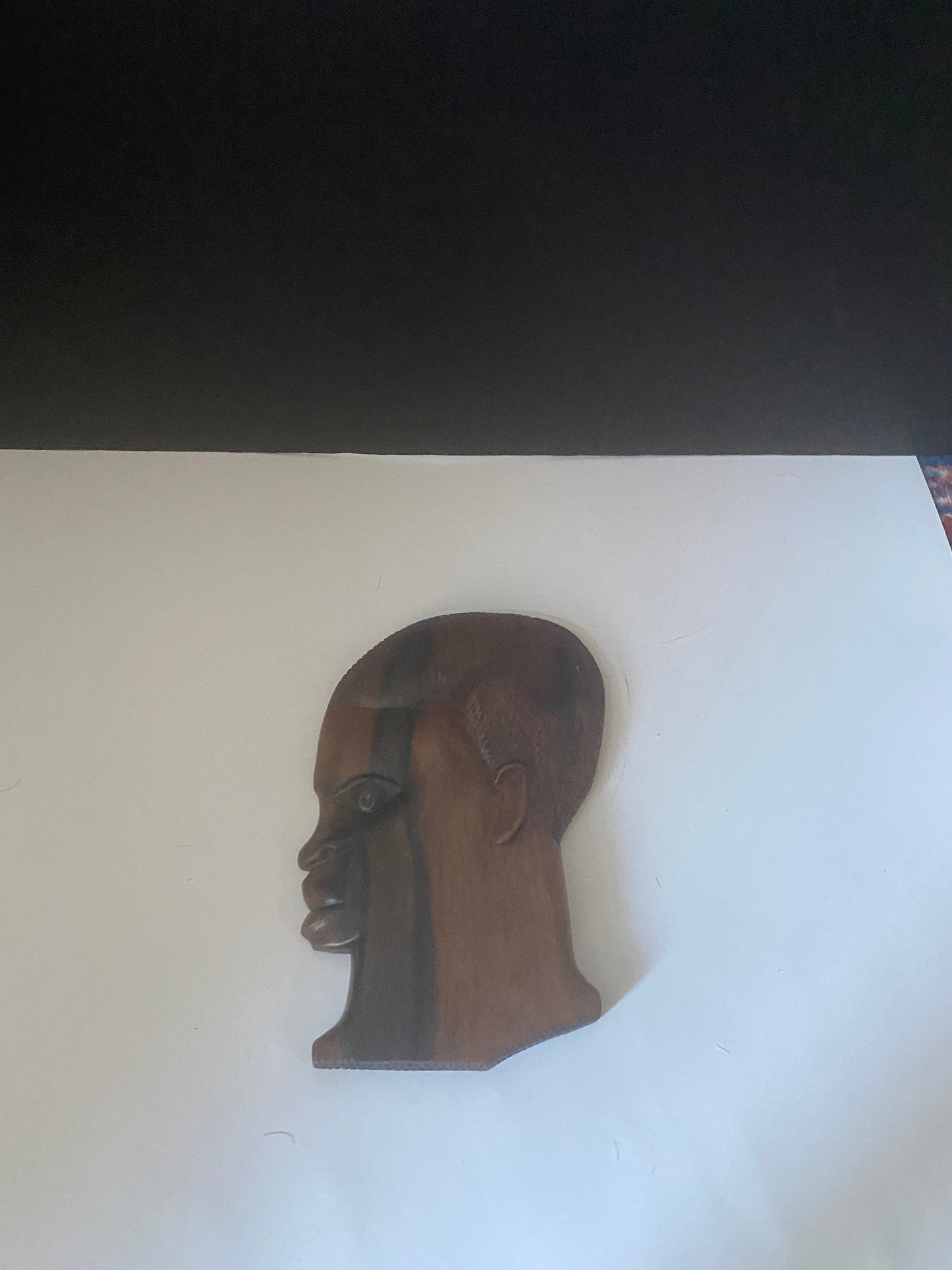 Vintage hanging Western African hardwood plaque of a man