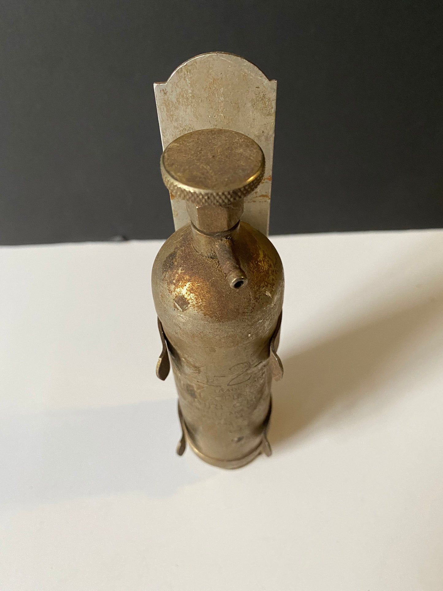 A 8 inch salesman sample fire Extinguisher with bracket very old very cool Philadelphia