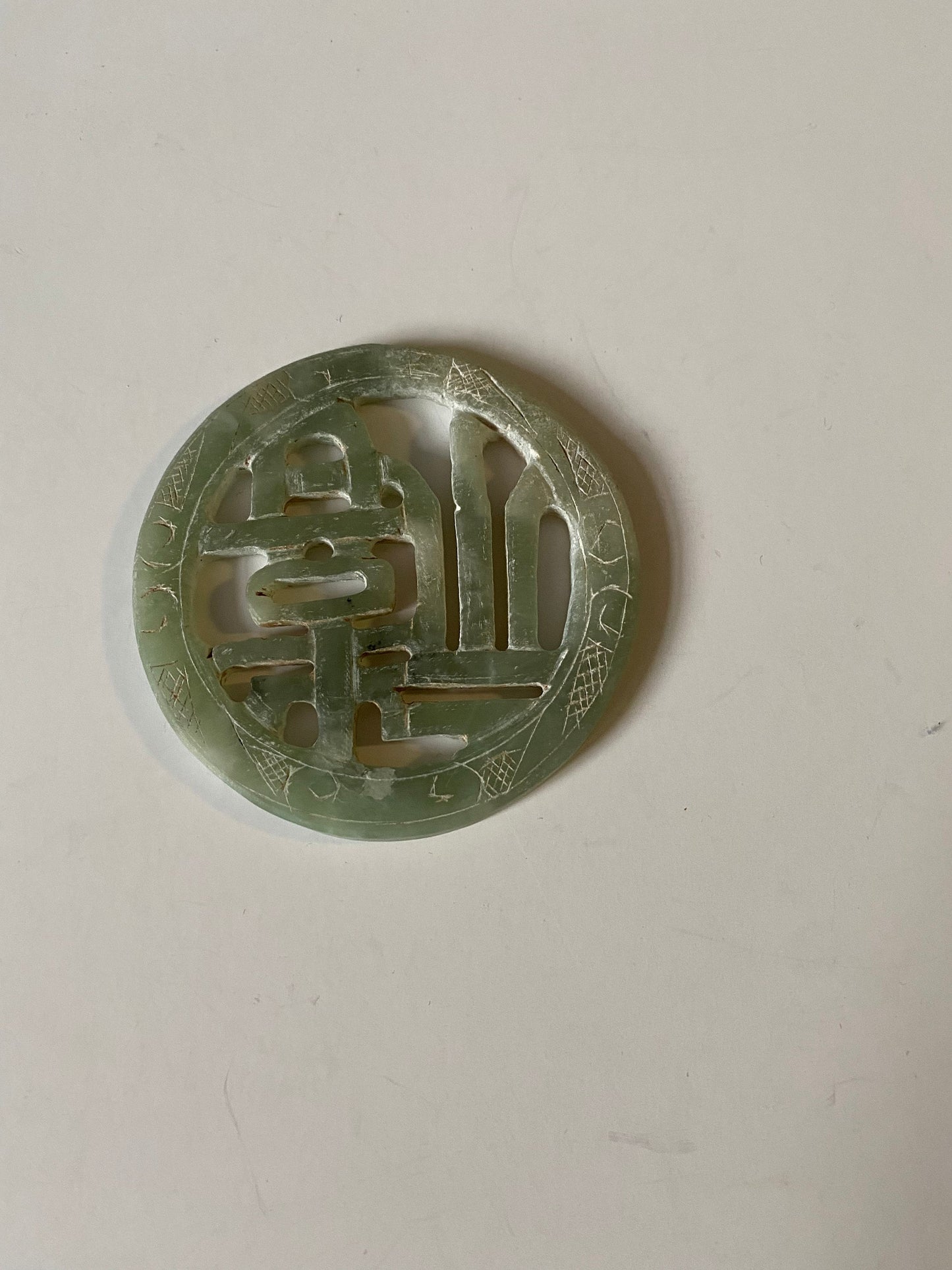 A Chinese 3 inch jade plaque