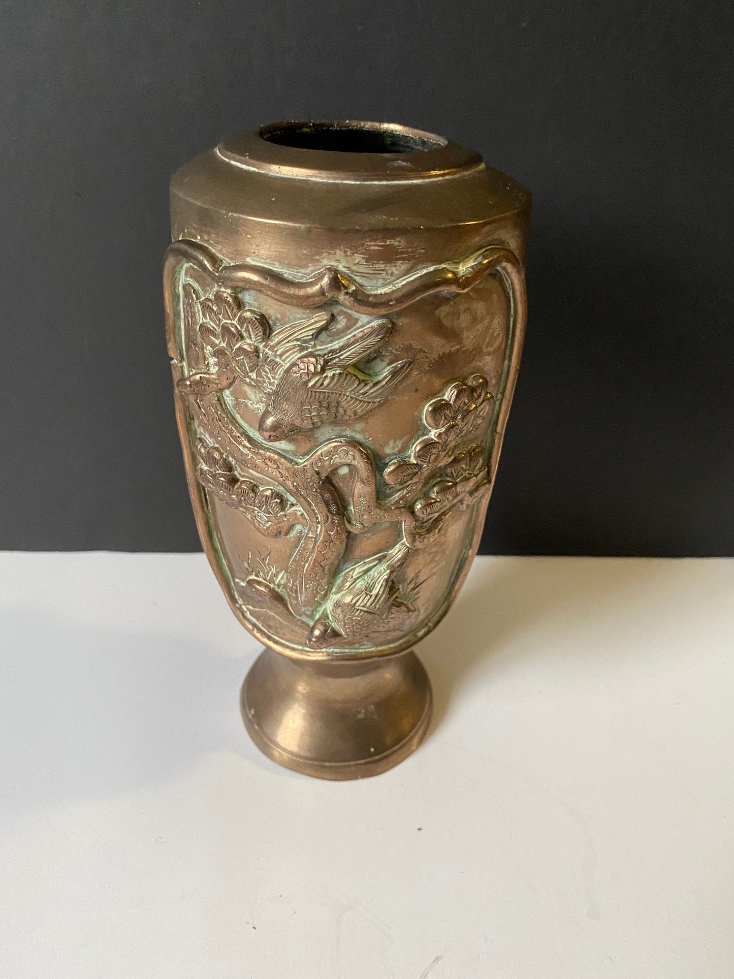 A 9 inch heavy bronze Chinese vase depicting birds on branches Approximately 500 g stunning patina