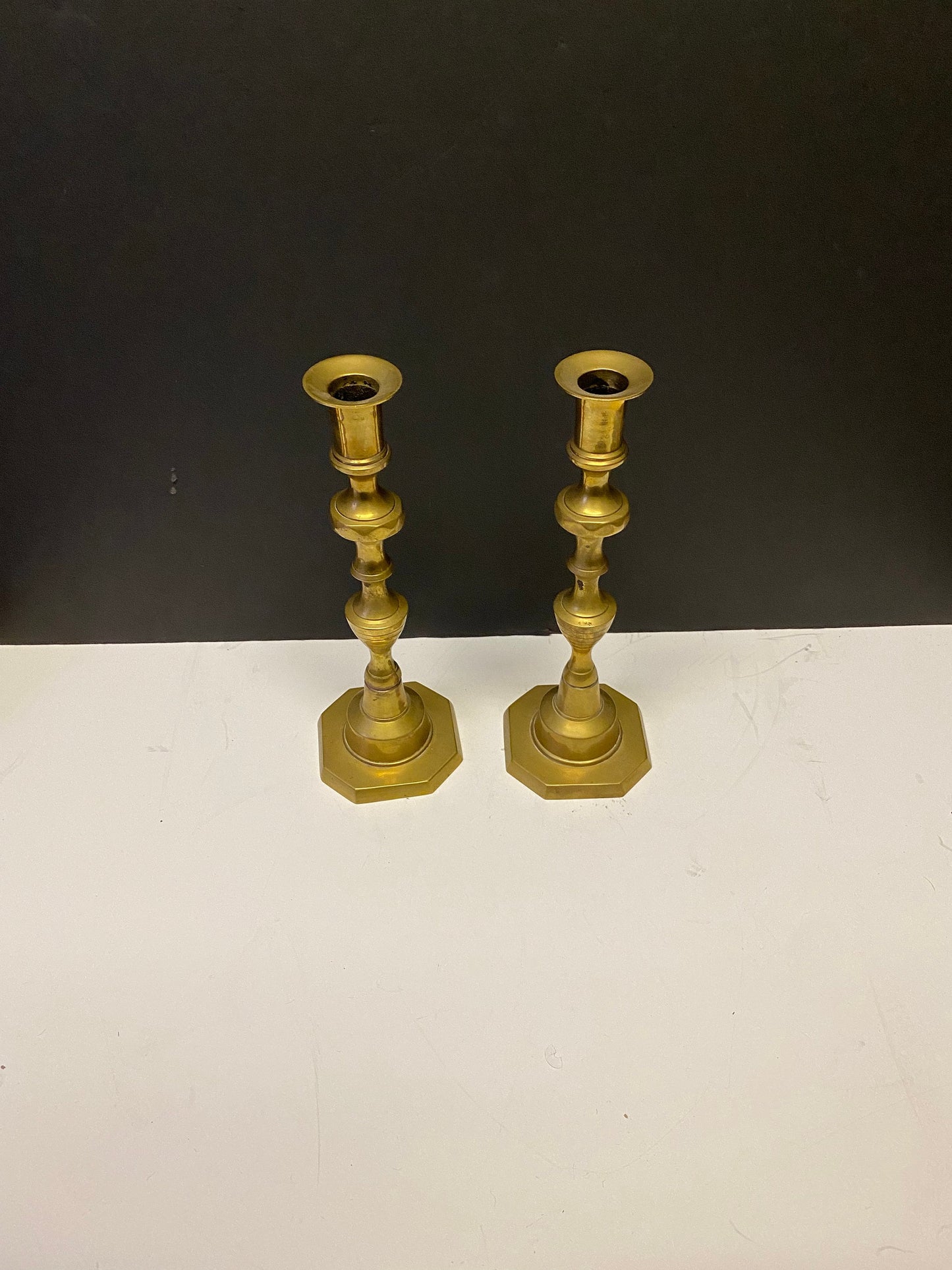 A  Pair heavy heavy brass Antique candlesticks 10 inches tall  Good quality  over 1kg
