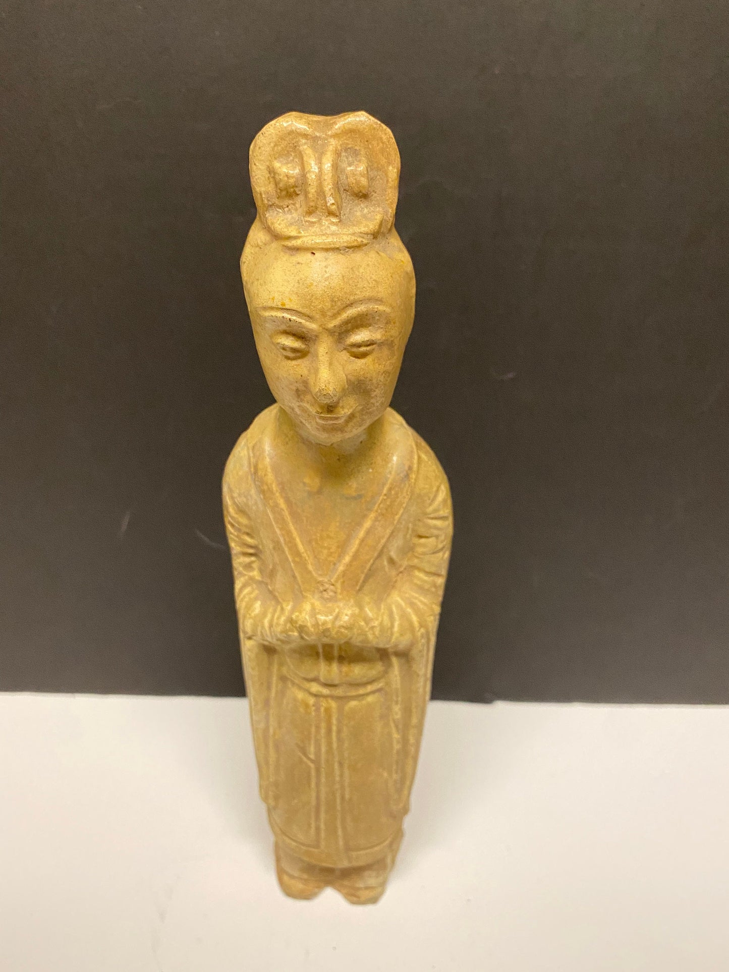 A Museum quality 11 inch Chinese pottery statue depicting serene praying man Evaluated as sui dynasty small crack in neck
