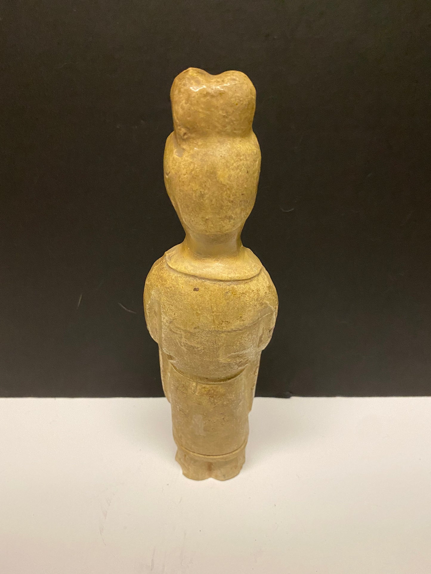 A Museum quality 11 inch Chinese pottery statue depicting serene praying man Evaluated as sui dynasty small crack in neck
