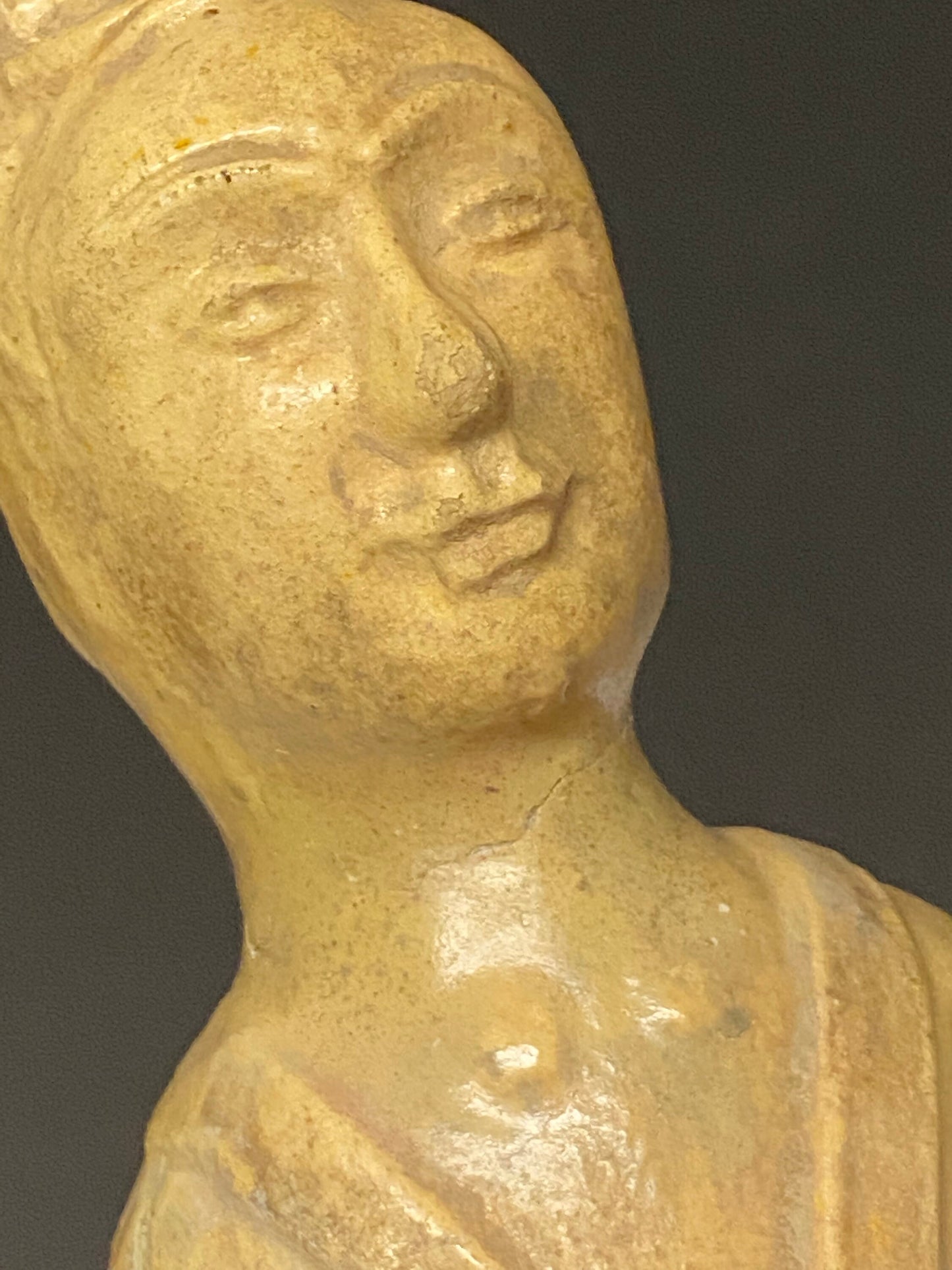 A Museum quality 11 inch Chinese pottery statue depicting serene praying man Evaluated as sui dynasty small crack in neck