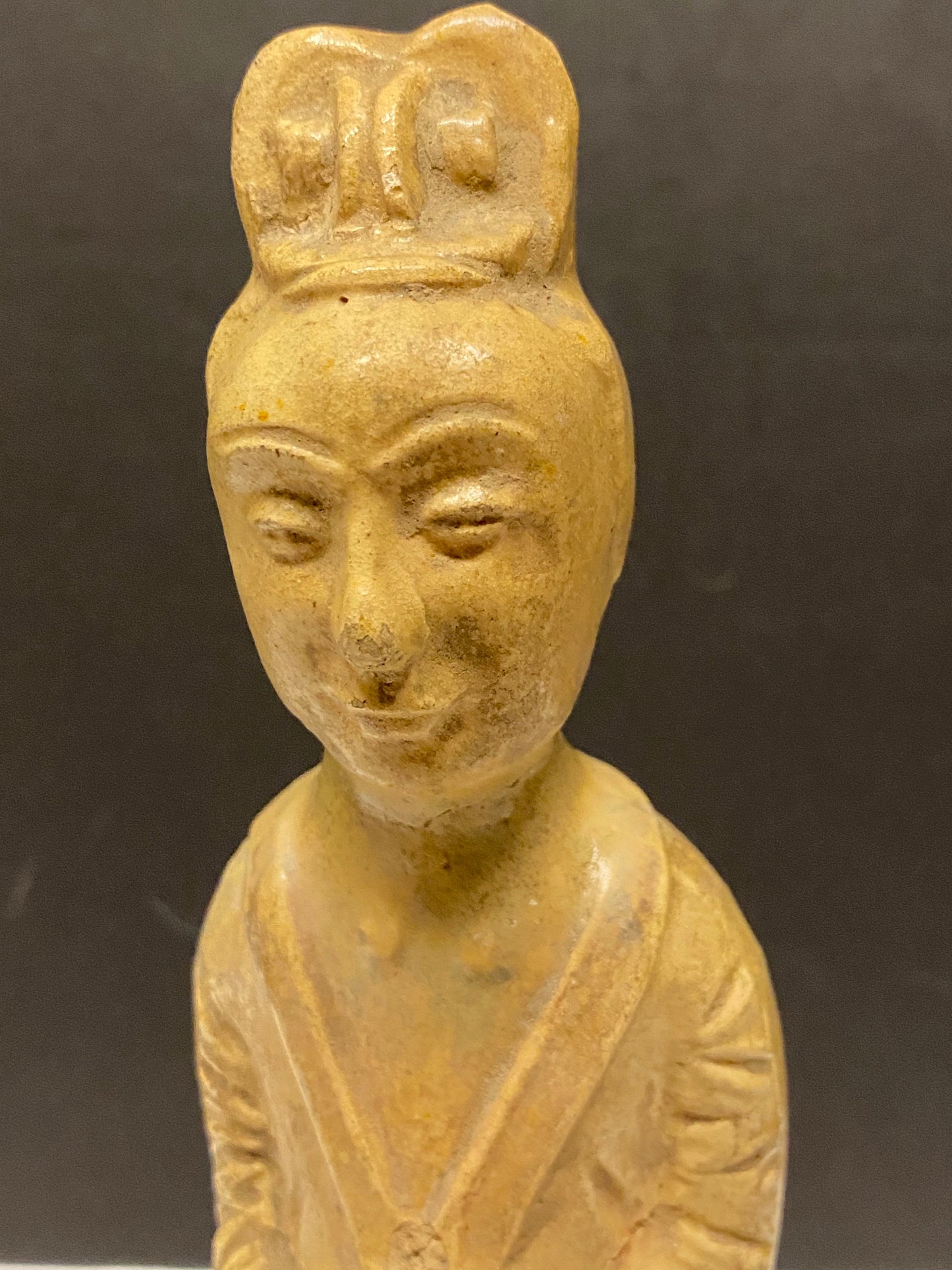 A Museum quality 11 inch Chinese pottery statue depicting serene praying man Evaluated as sui dynasty small crack in neck