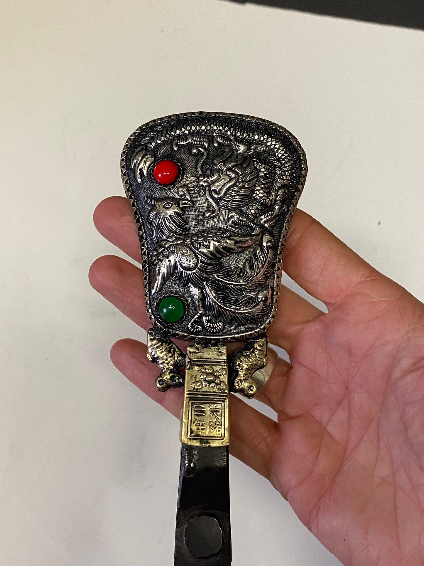 A 7 inch Chinese silver and hard stone handled mirror with dragon Phoenix and Koi fish decoration small and lovely