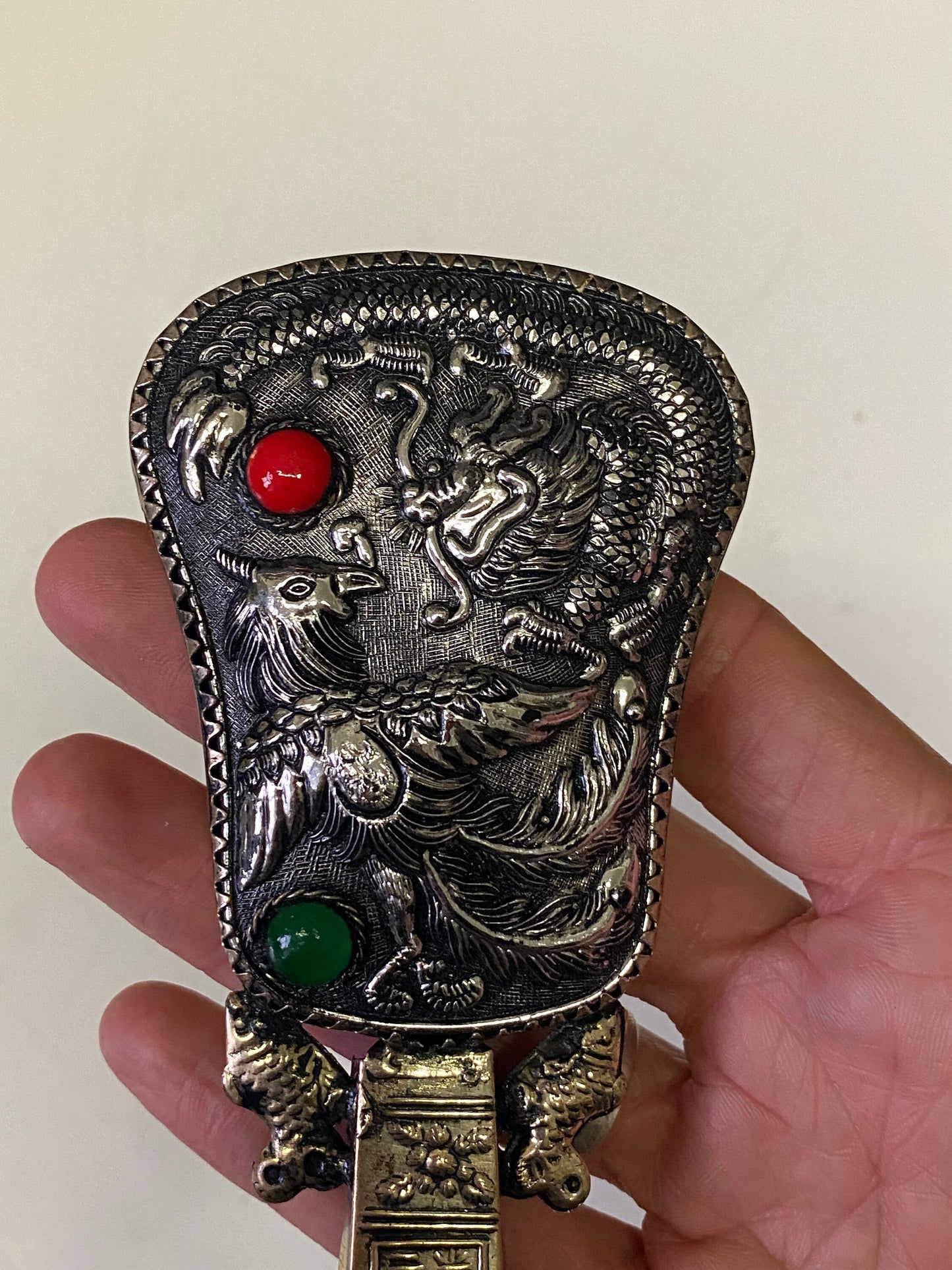 A 7 inch Chinese silver and hard stone handled mirror with dragon Phoenix and Koi fish decoration small and lovely