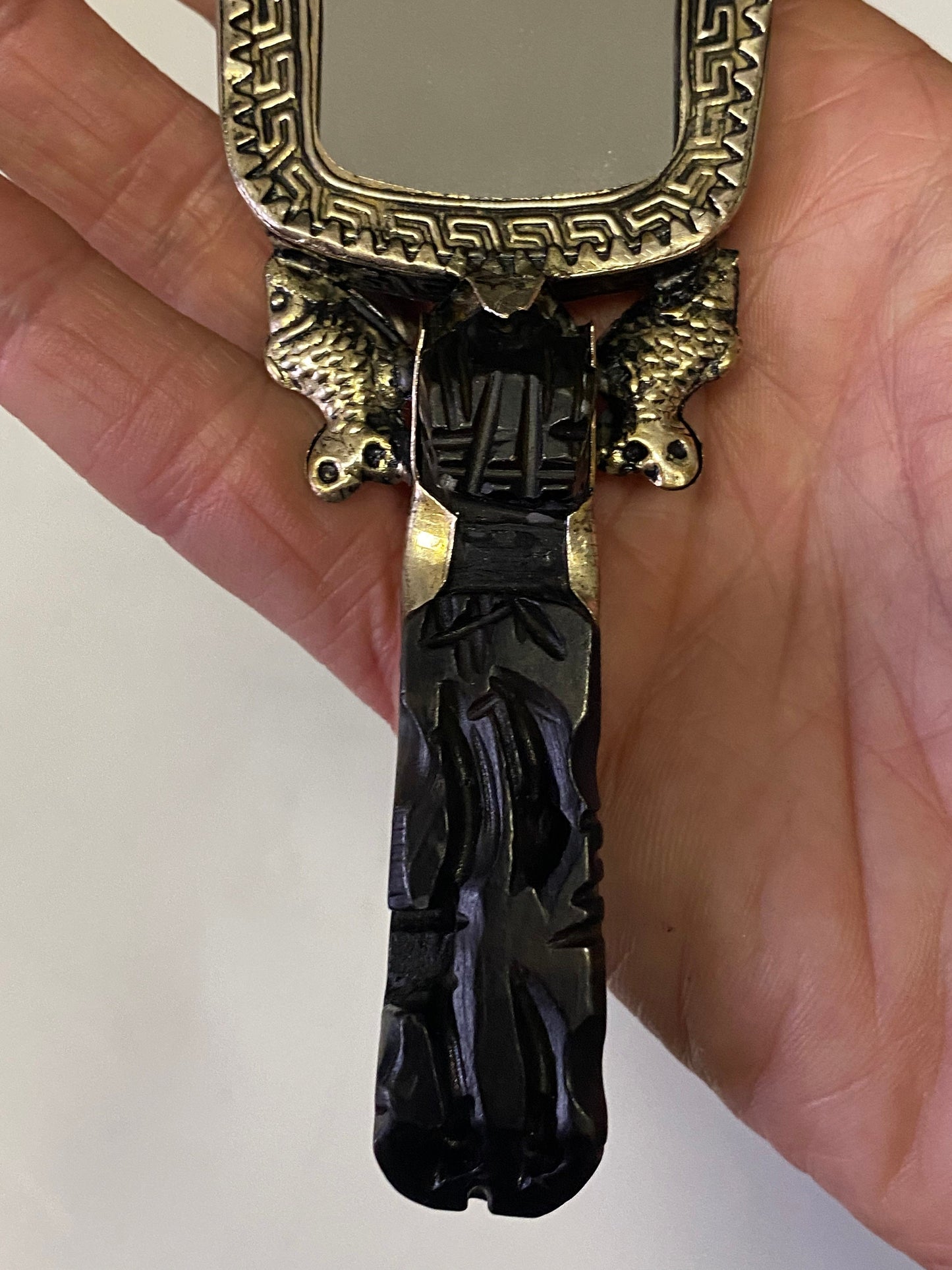 A 7 inch Chinese silver and hard stone handled mirror with dragon Phoenix and Koi fish decoration small and lovely
