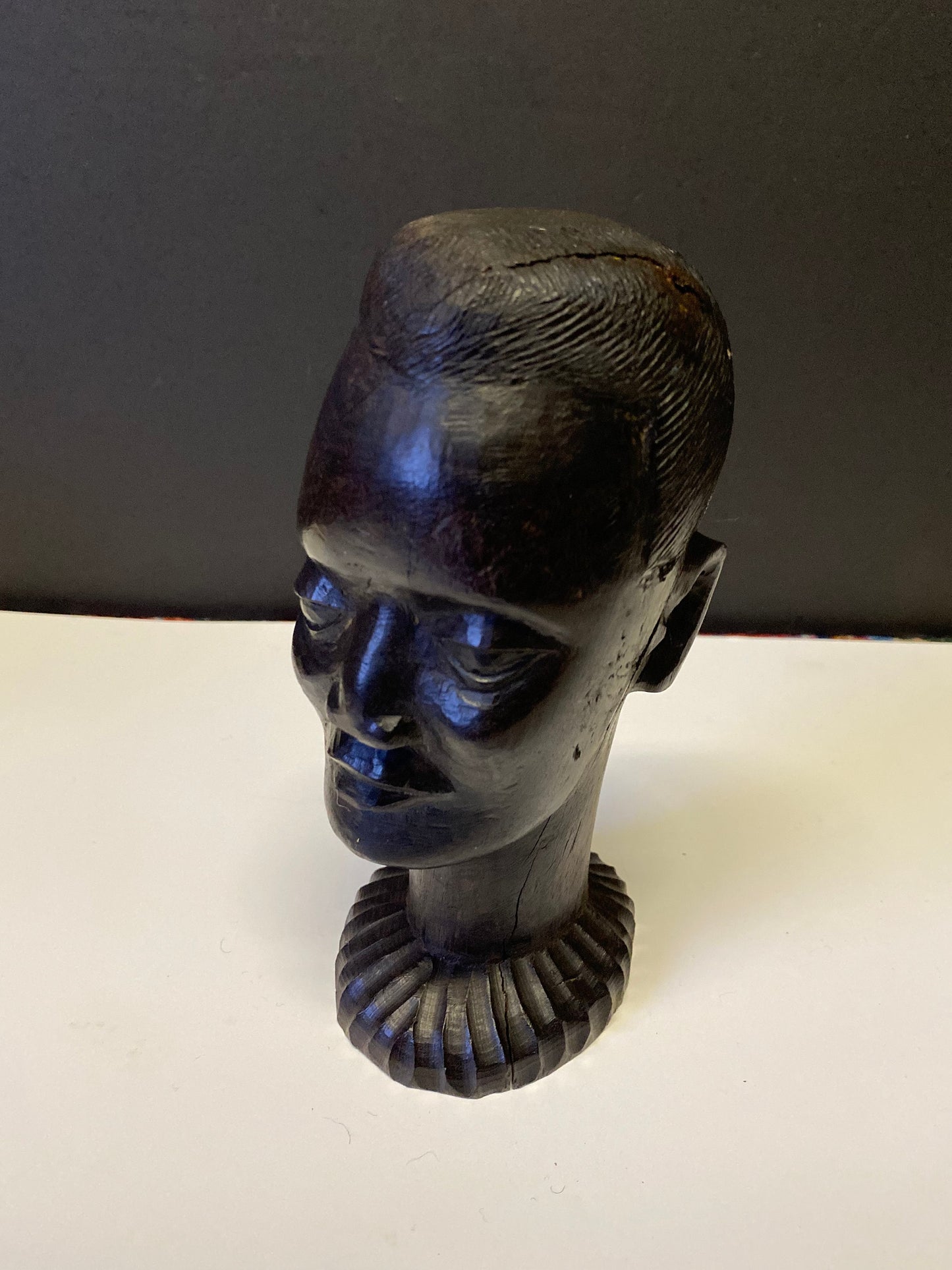 A  Fabulous western 8 inch African Carved Ebony bust of a male warrior  great detail  wow  seen some wars but tragically perfect