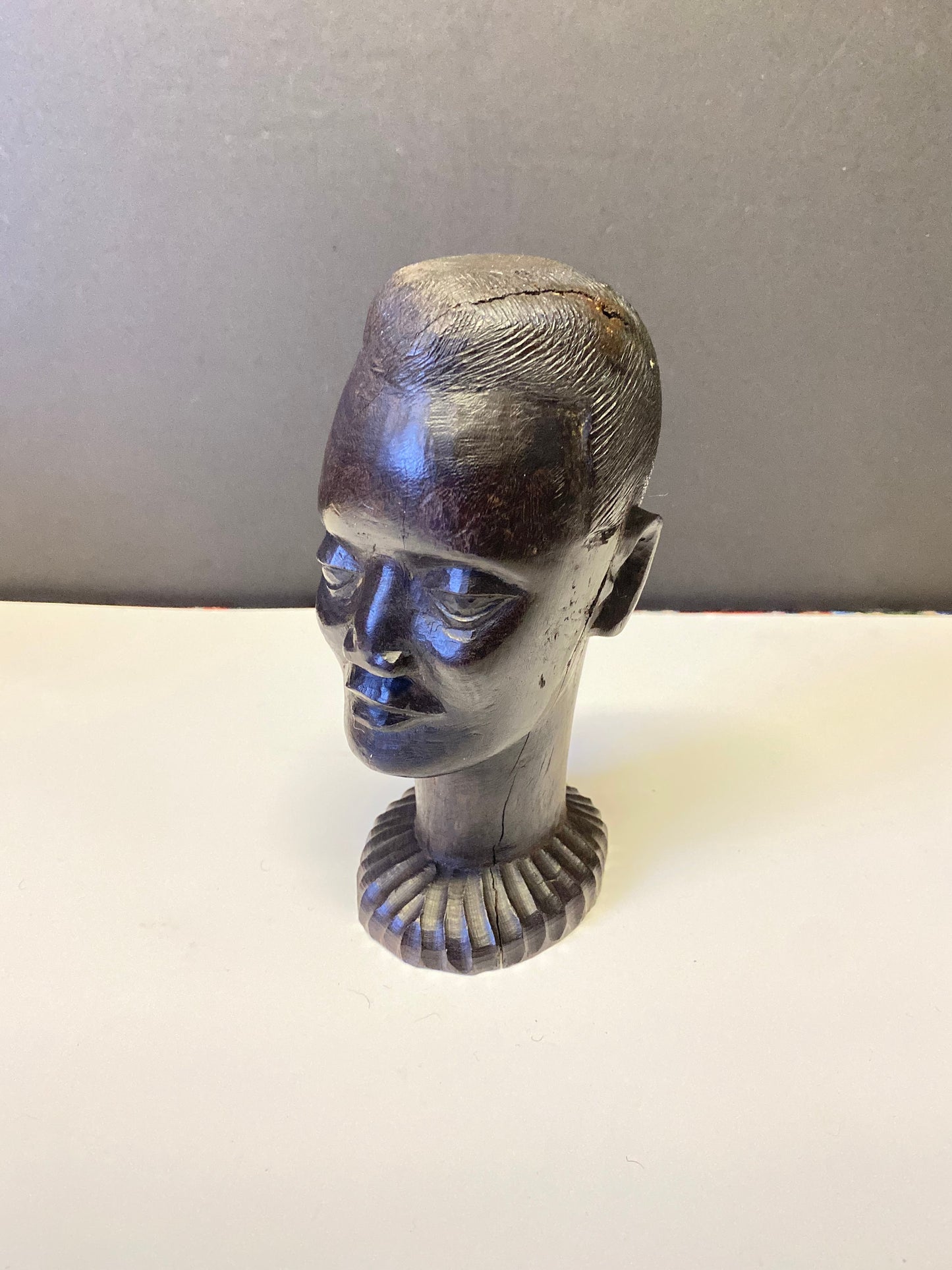 A  Fabulous western 8 inch African Carved Ebony bust of a male warrior  great detail  wow  seen some wars but tragically perfect