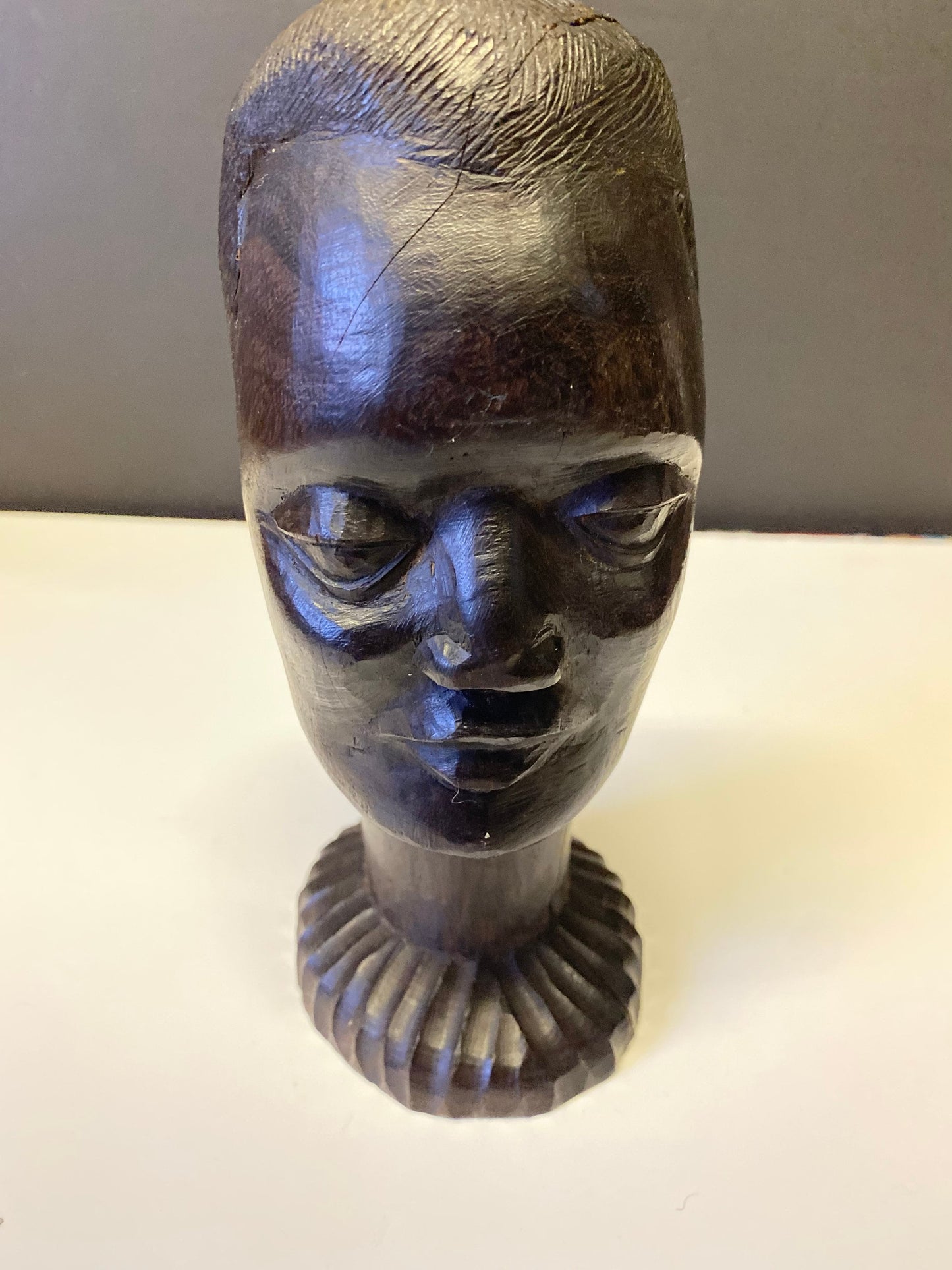 A  Fabulous western 8 inch African Carved Ebony bust of a male warrior  great detail  wow  seen some wars but tragically perfect