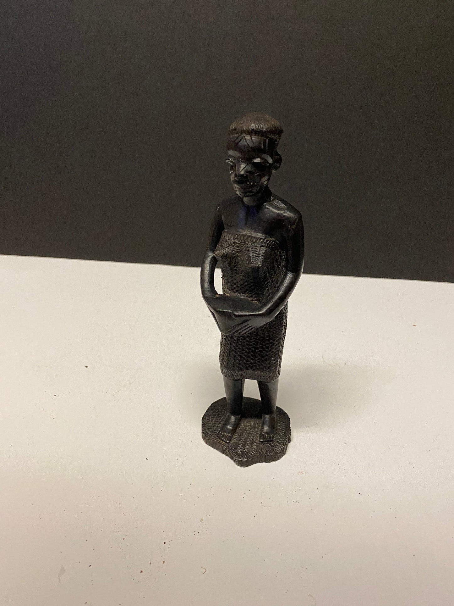 Fabulous 7 inch West African carved wooden statue of a woman well modelled wow