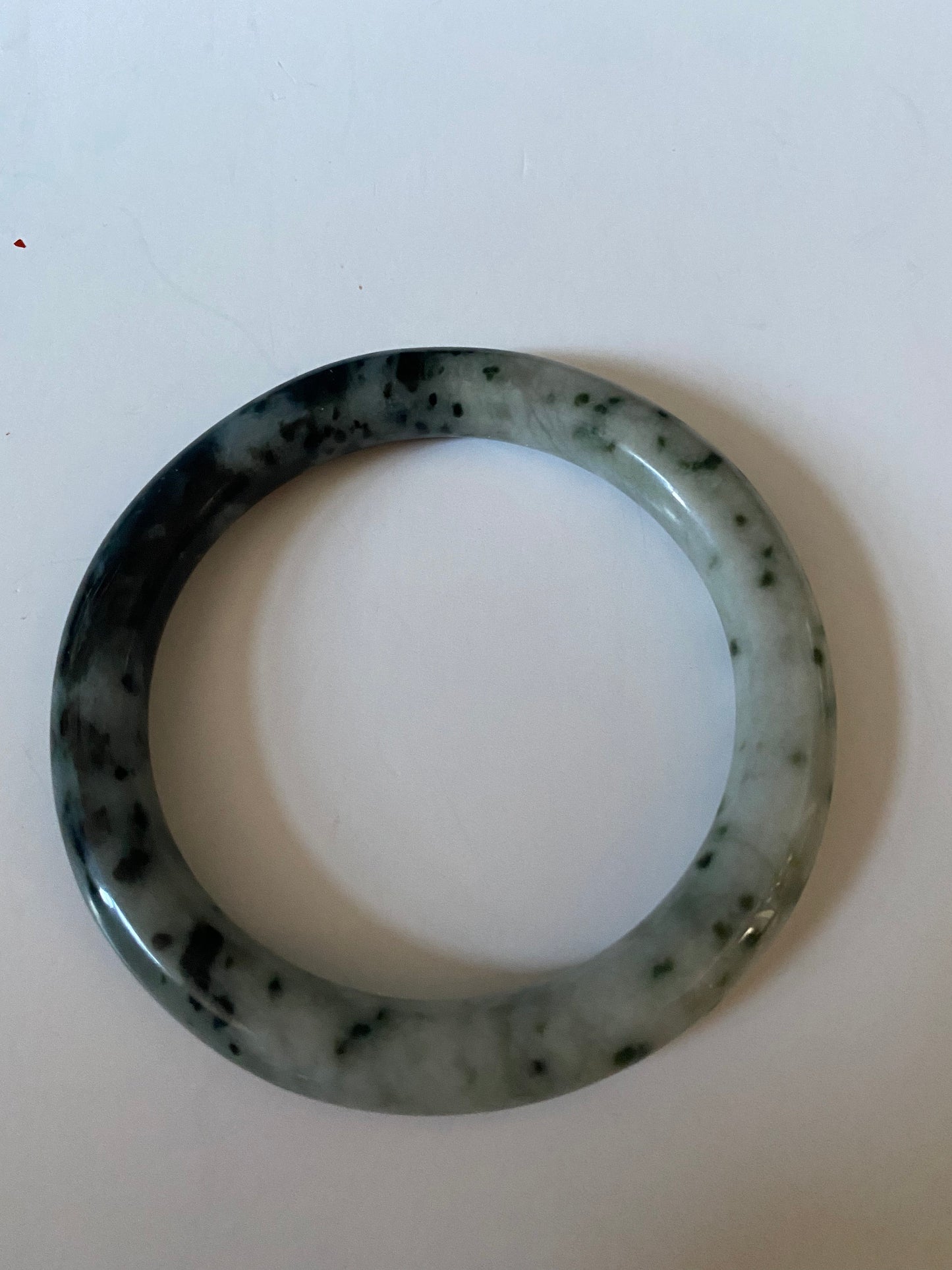 An Absolutely fabulous Chinese rare Jade bangle Mixture of green and black jades 3 inches with 2 inches inside Museum quality wow