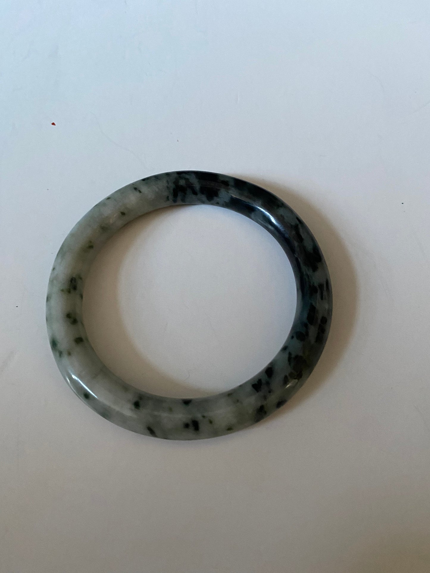 An Absolutely fabulous Chinese rare Jade bangle Mixture of green and black jades 3 inches with 2 inches inside Museum quality wow
