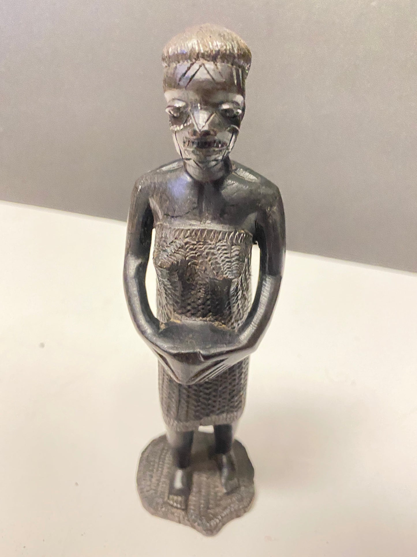 Fabulous 7 inch West African carved wooden statue of a woman well modelled wow