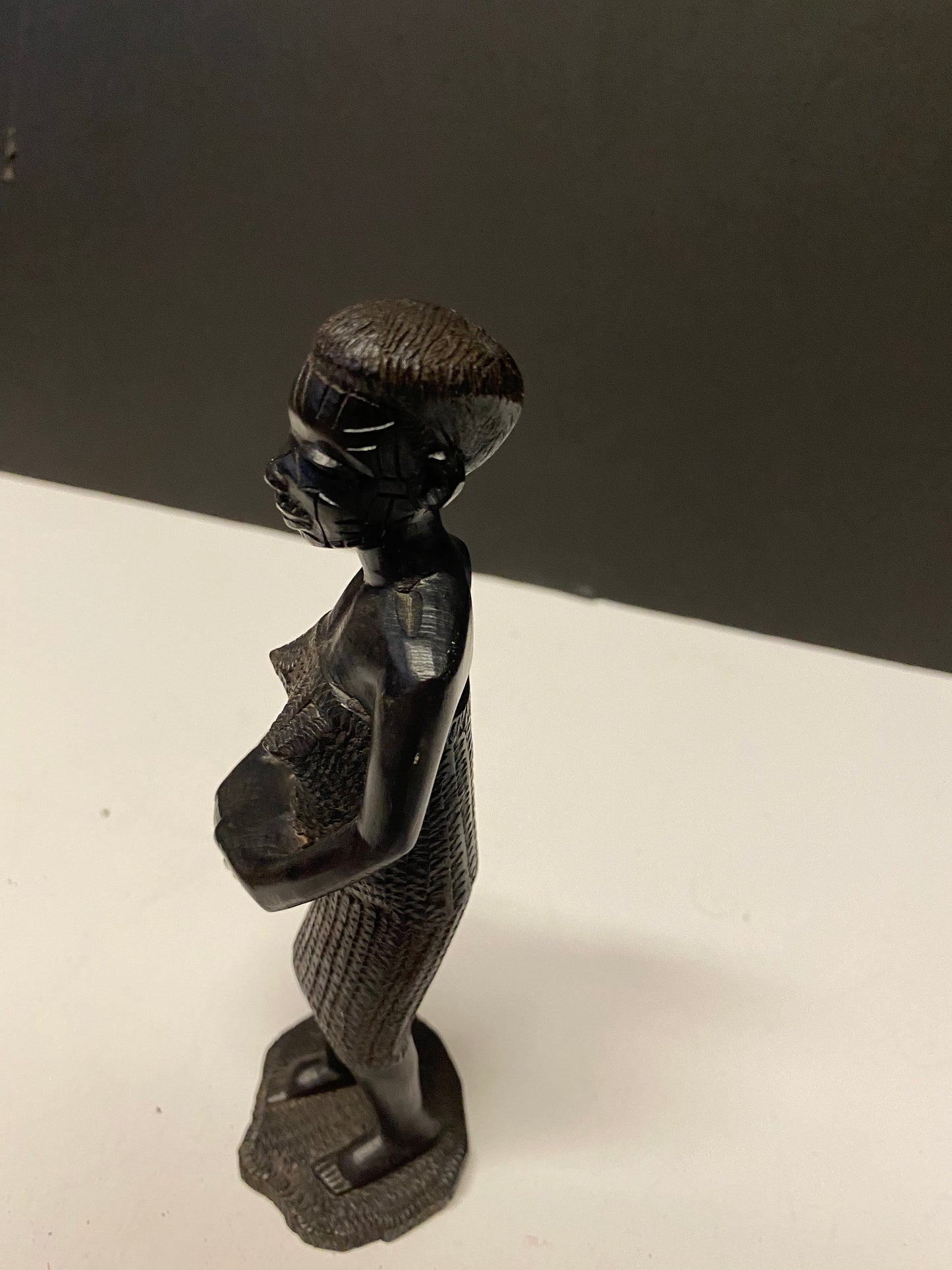 Fabulous 7 inch West African carved wooden statue of a woman well modelled wow