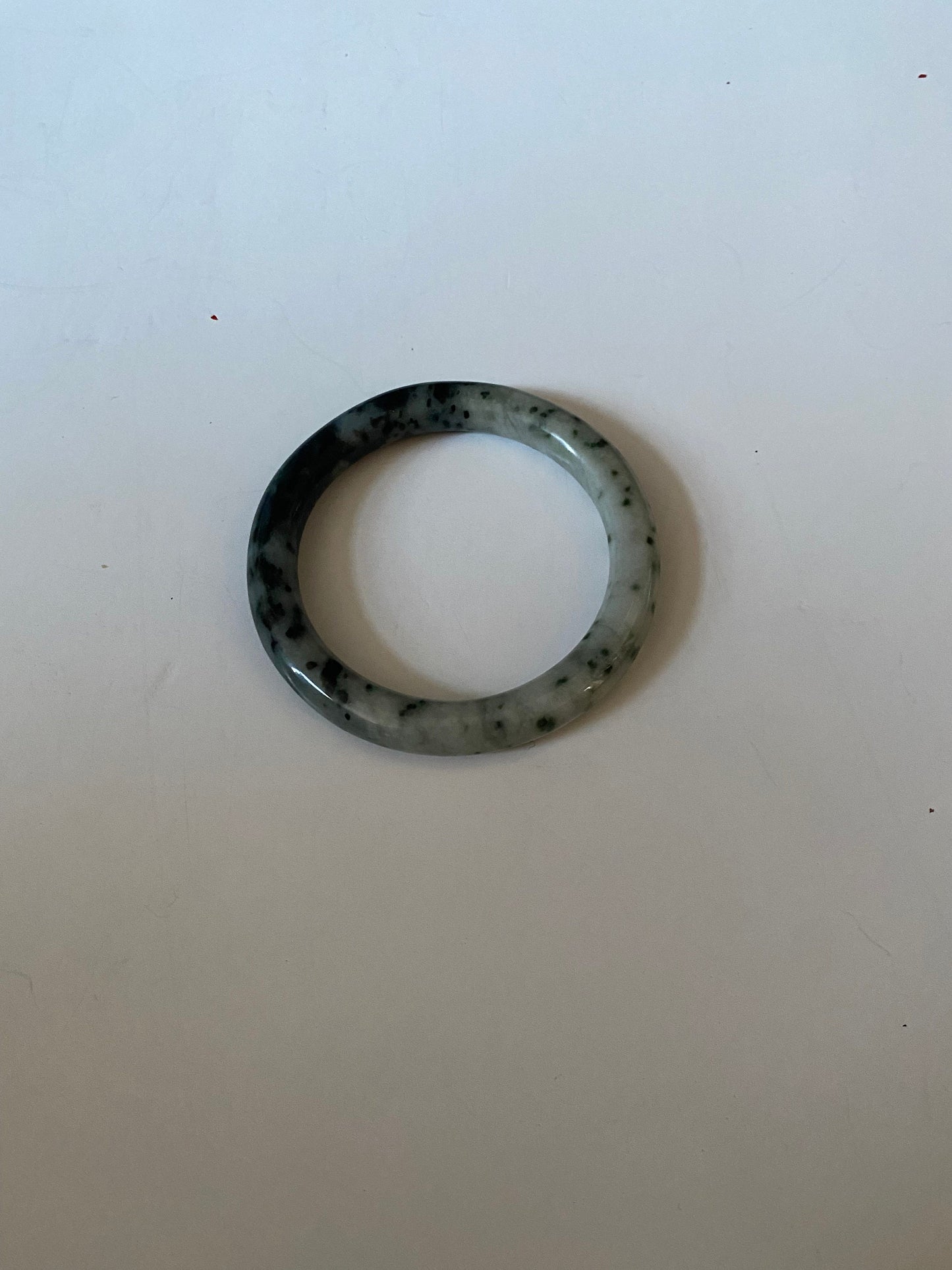 An Absolutely fabulous Chinese rare Jade bangle Mixture of green and black jades 3 inches with 2 inches inside Museum quality wow