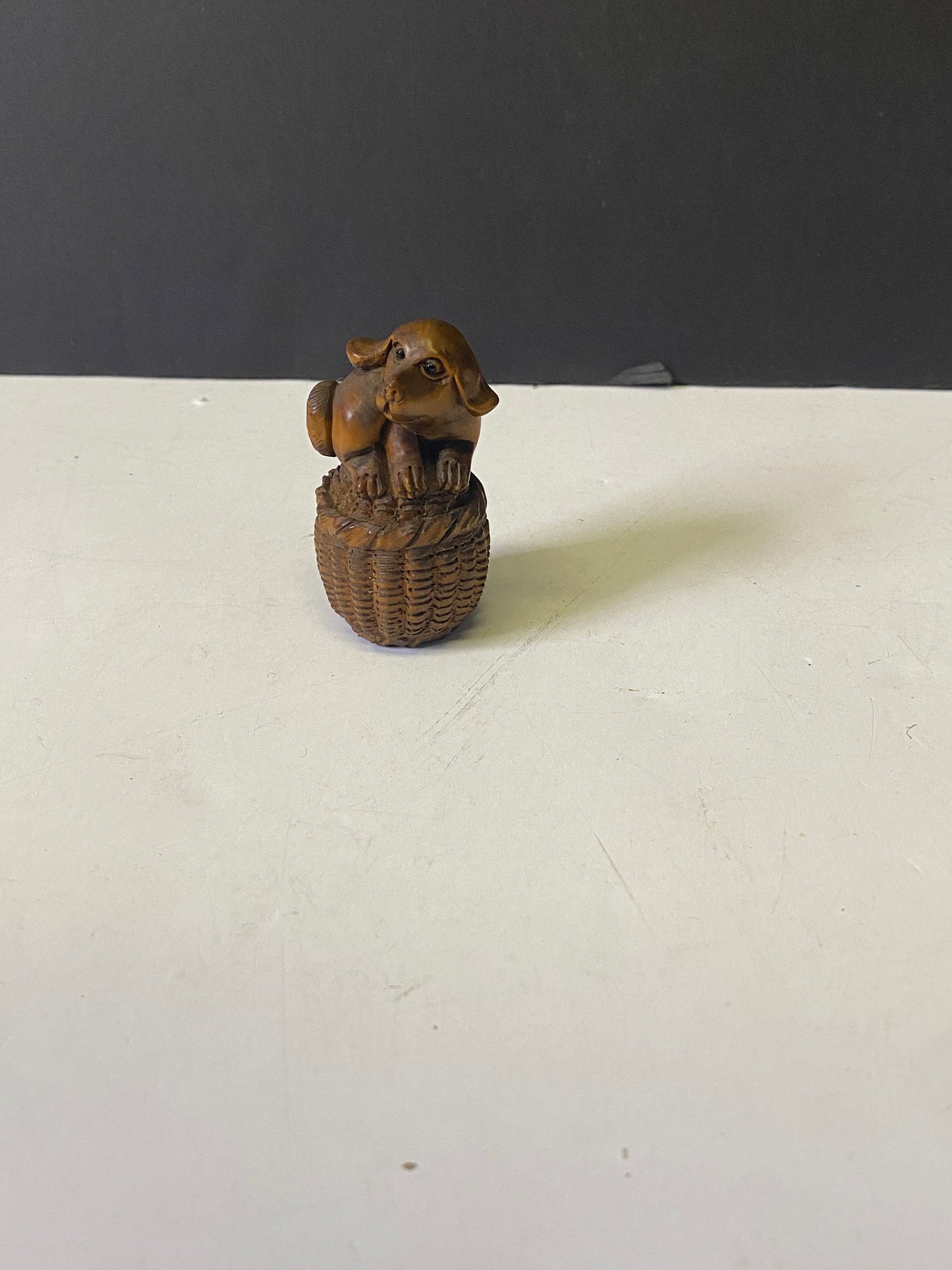 Absolutely fabulous 2 inch antique authentic Boxwood netsuke of a puppy in basket  Unbelievable detail  wow