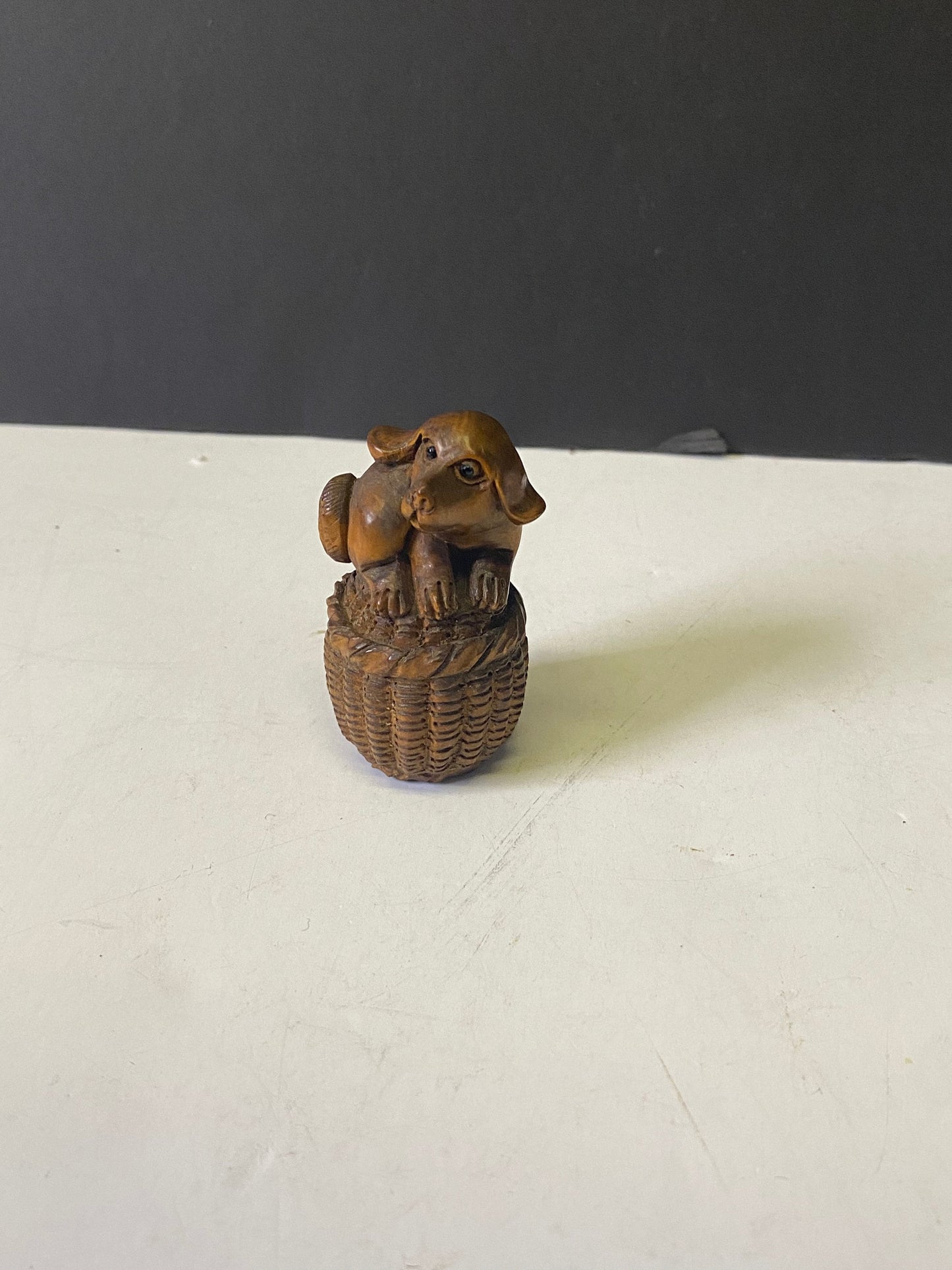 Absolutely fabulous 2 inch antique authentic Boxwood netsuke of a puppy in basket  Unbelievable detail  wow