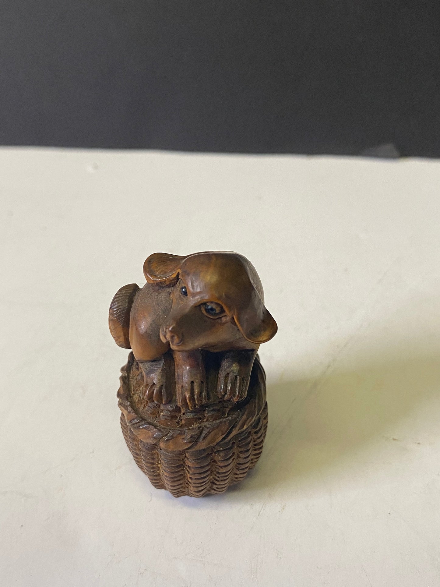 Absolutely fabulous 2 inch antique authentic Boxwood netsuke of a puppy in basket  Unbelievable detail  wow