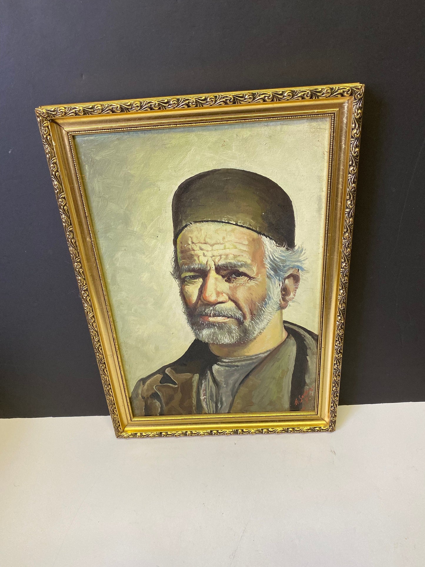 A  Fabulous 17 x 12 inch gilt framed Arabic oil portrait on canvas  signed H . Sookias 1973  great detail and presence  rare piece