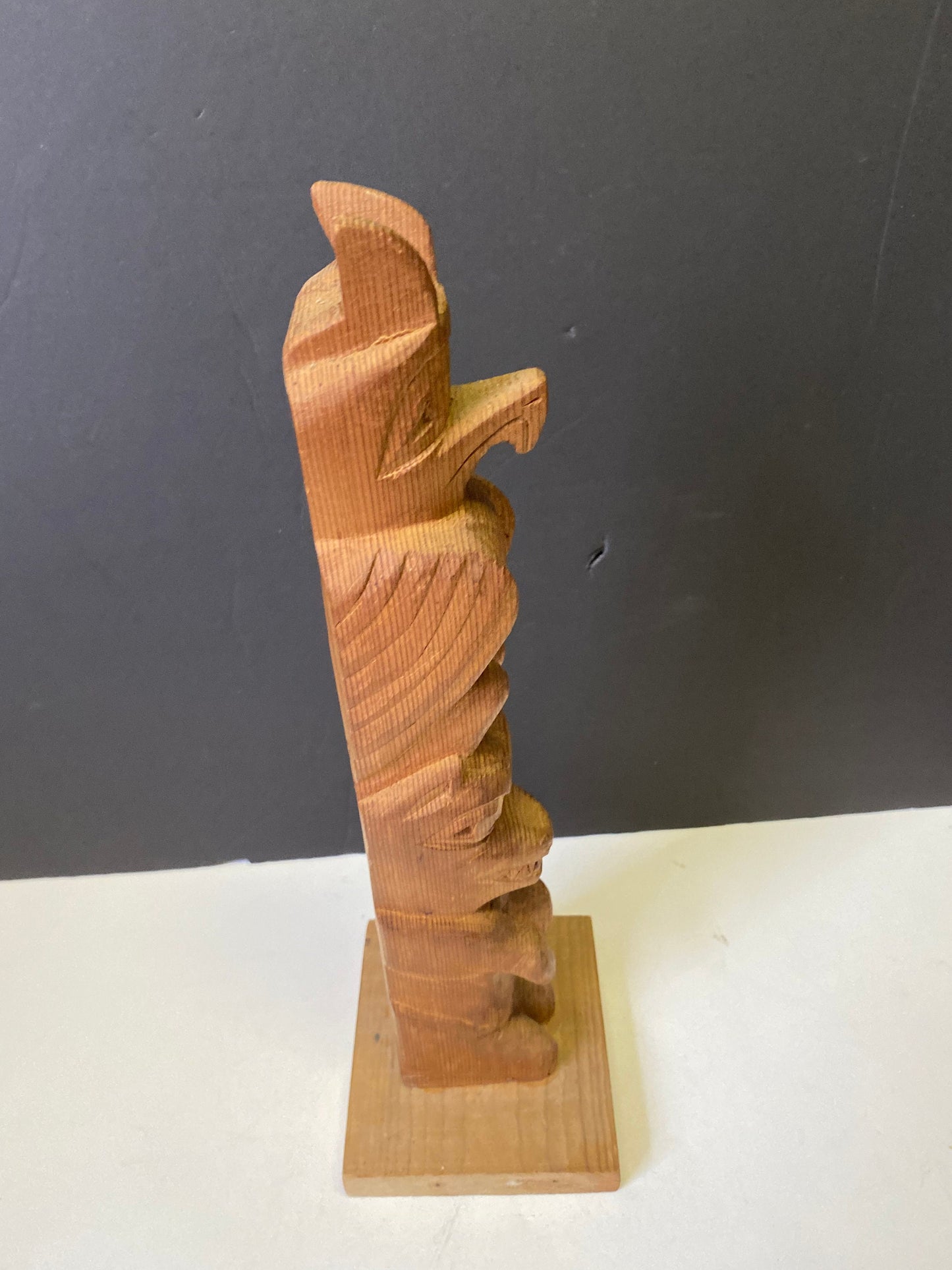 13 x 7 1970s indigenous Canadian female signed Indigenous totem pole Thunderbird to human and transformation well carved