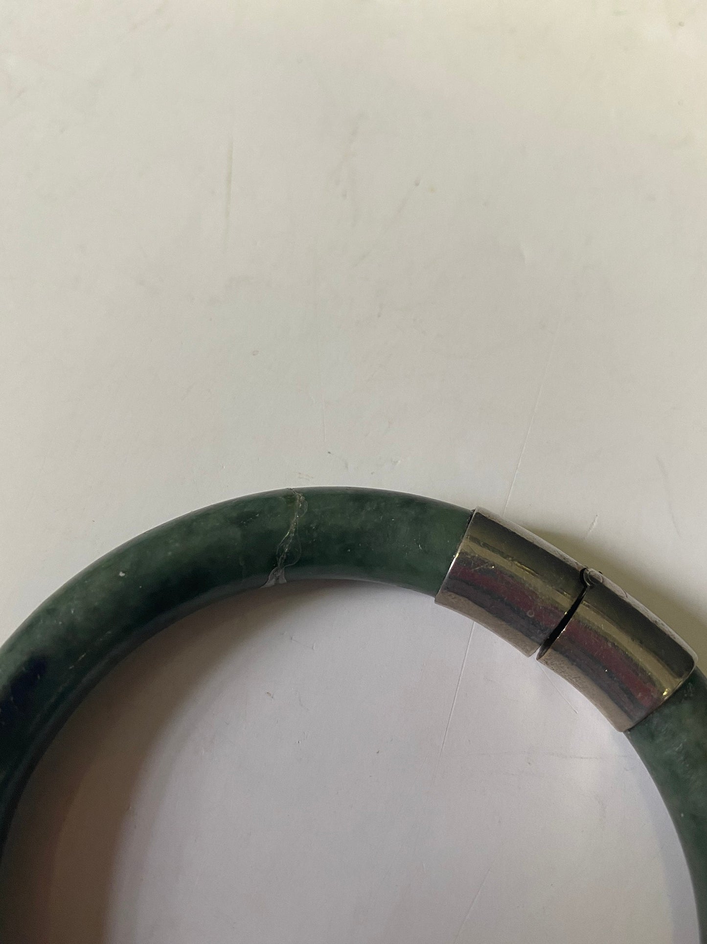 Lovely jade bangle with small crack value priced 2.3 inches inside
