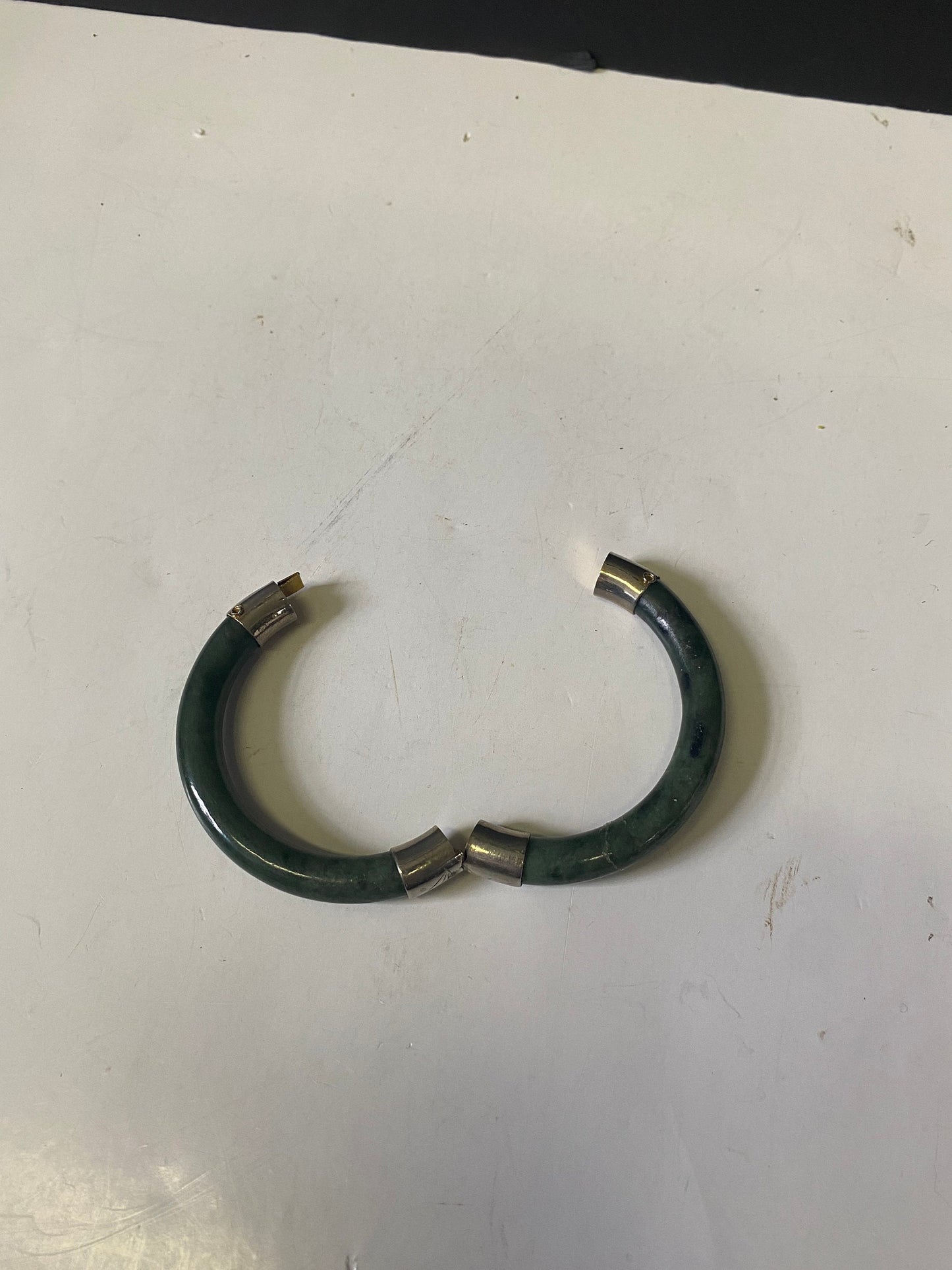 Lovely jade bangle with small crack value priced 2.3 inches inside