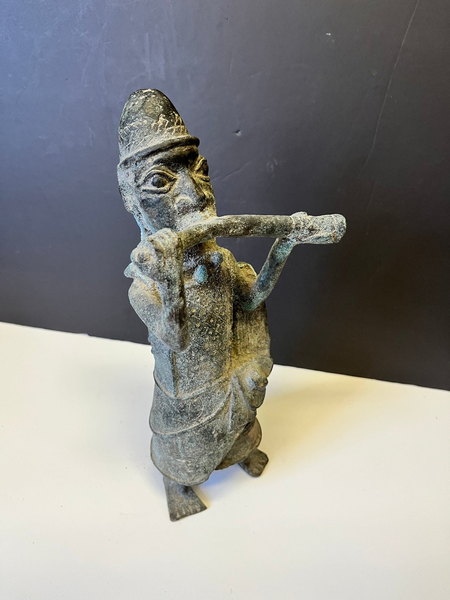 Absolutely magical 13 inch tall African Dogan bronze statue playing an instrument Early 19 century or earlier Wonderful Patina