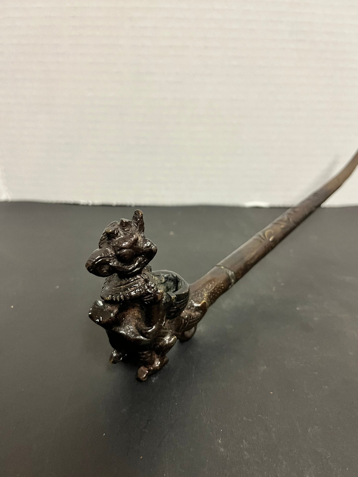 Absolutely fabulous 11 inch long Tibetan bronze pipe depicting a mythical creature with great detail and patina gift alert