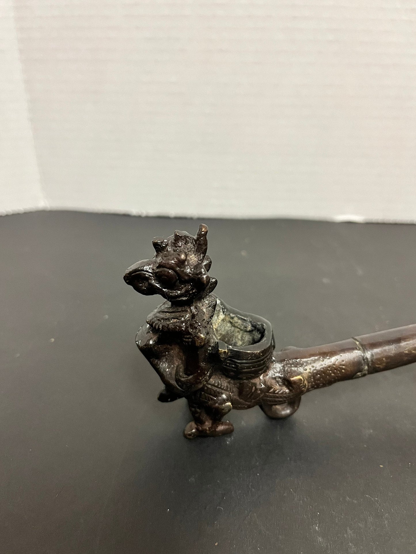 Absolutely fabulous 11 inch long Tibetan bronze pipe depicting a mythical creature with great detail and patina gift alert