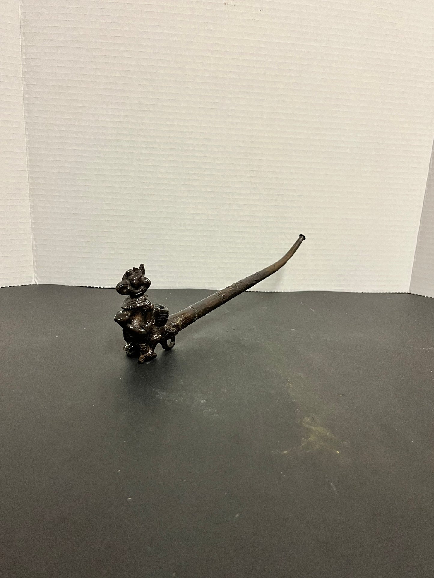 Absolutely fabulous 11 inch long Tibetan bronze pipe depicting a mythical creature with great detail and patina gift alert