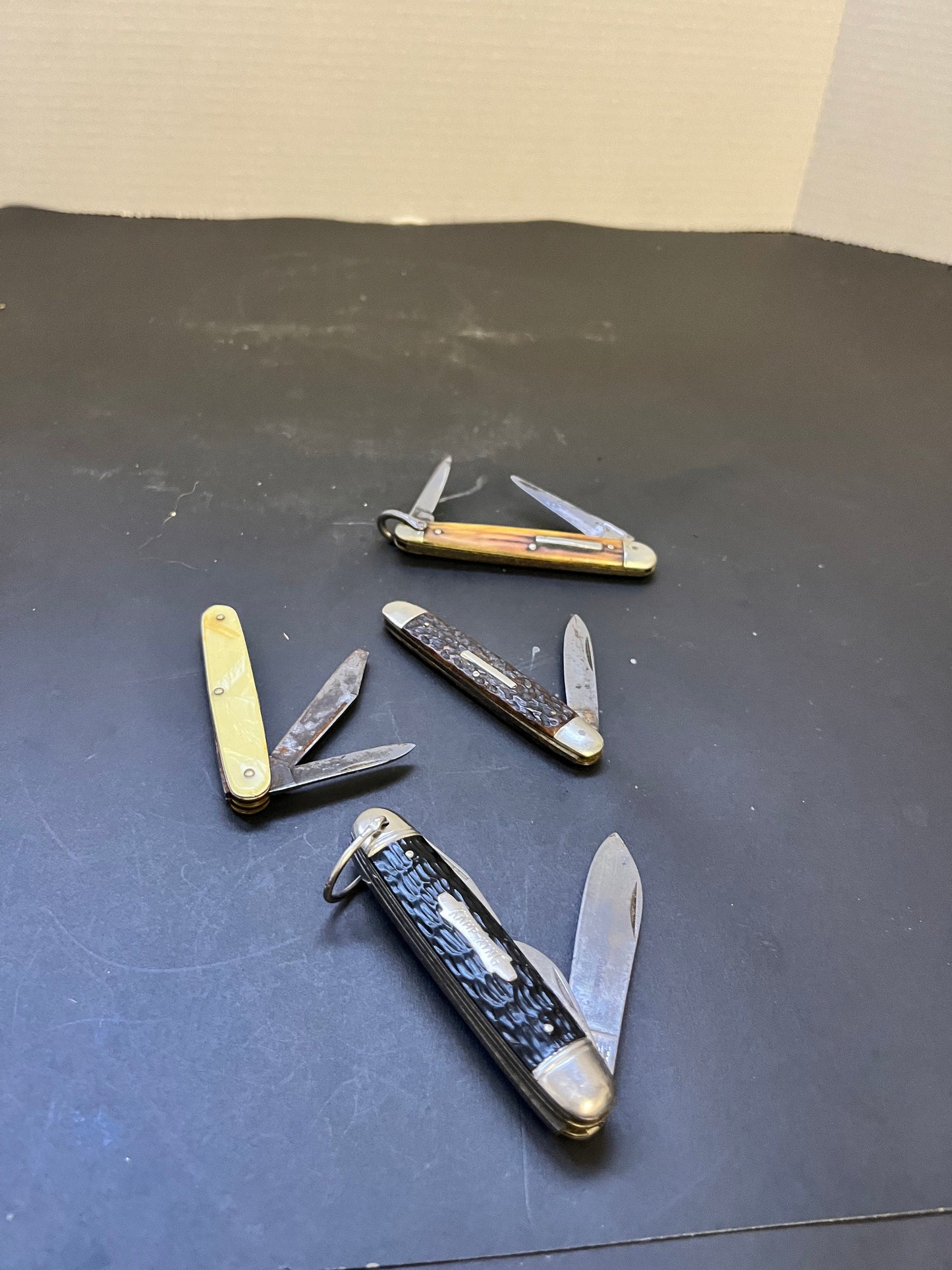 Group of four antique penknives