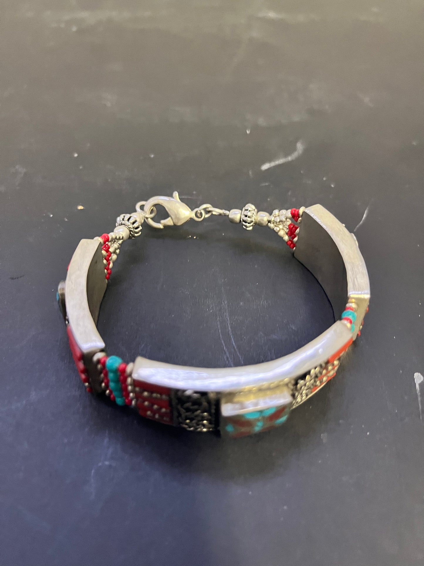 Antique Tibetan, Sterling, turquoise and Coral 8 inch bracelet