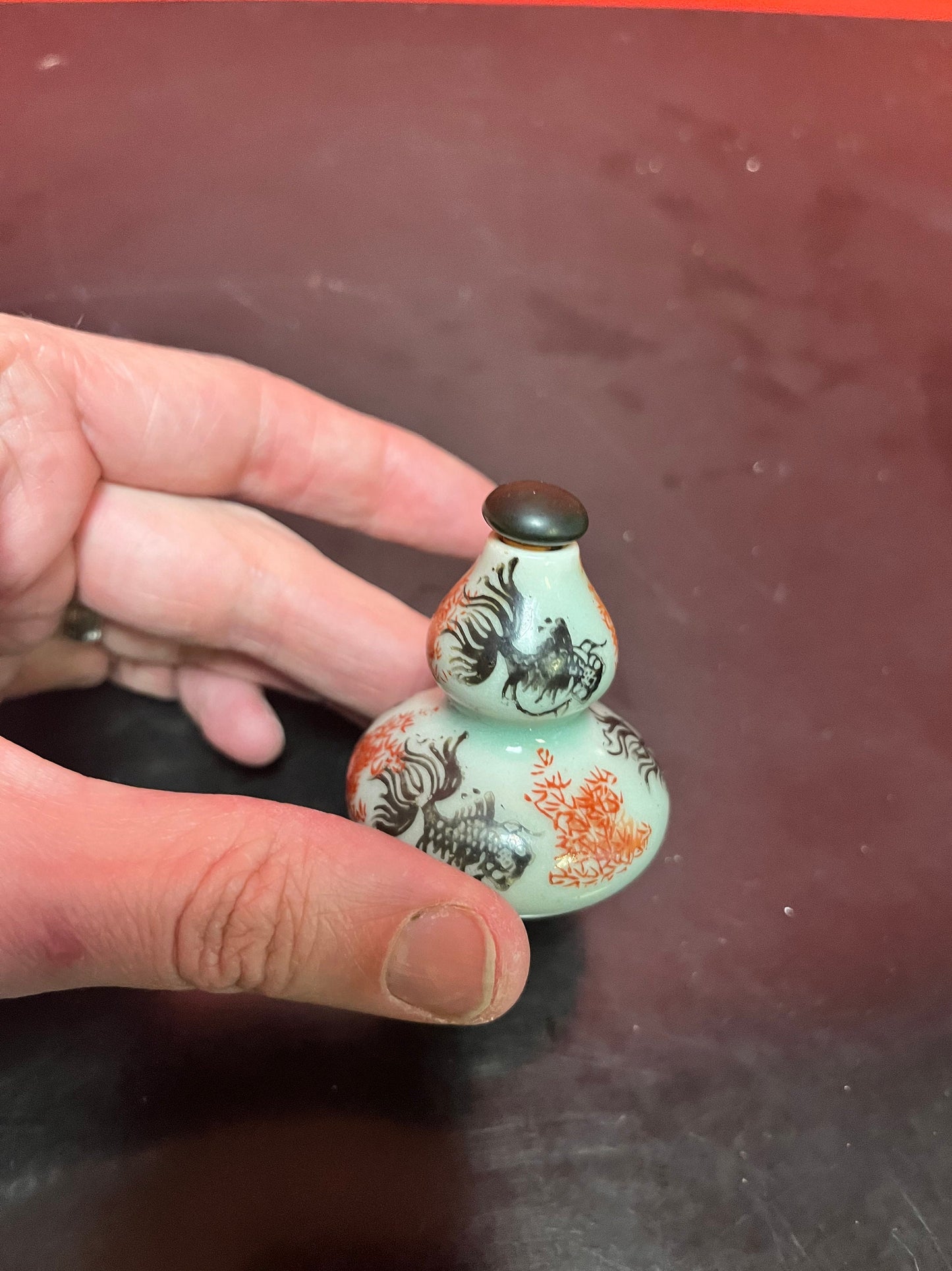 An Antique Chinese 3 inch high double barrelled porcelain snuff bottle with koi fish and flowers - great value