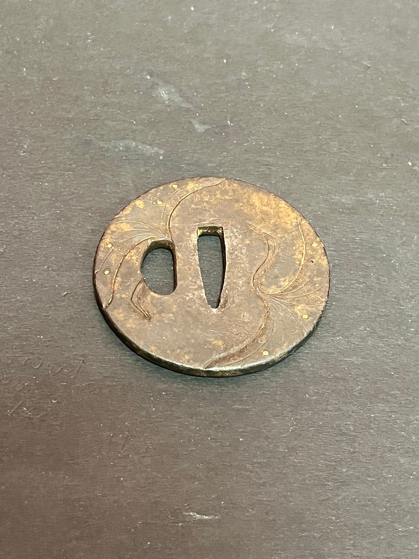 A Japanese ancient bronze samurai sword tsuba really old and detailed 3 inches some rust patina