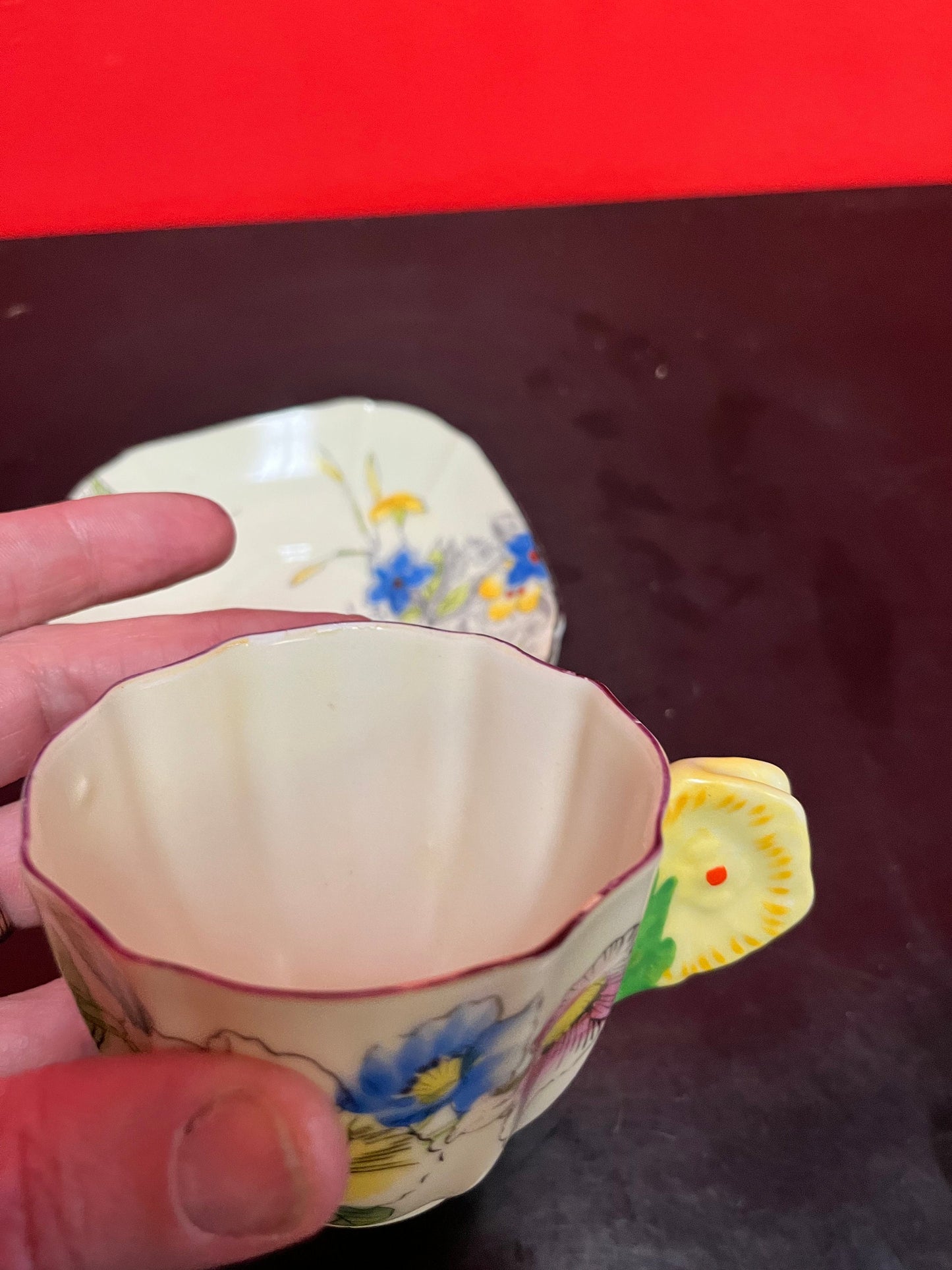 A  Rare unusual English cup and saucer with flower handle  lovely condition and a great price