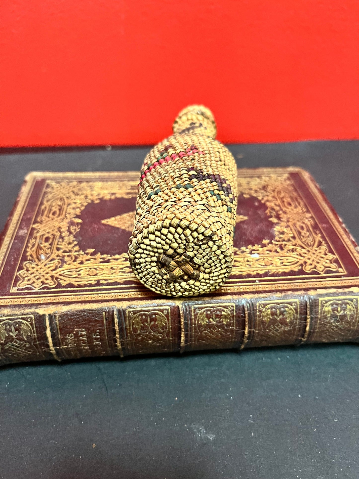 Lovely 5 inch high indigenous, first nations pacific northwest coast woven covered bottle  with hunting scene  mint condition