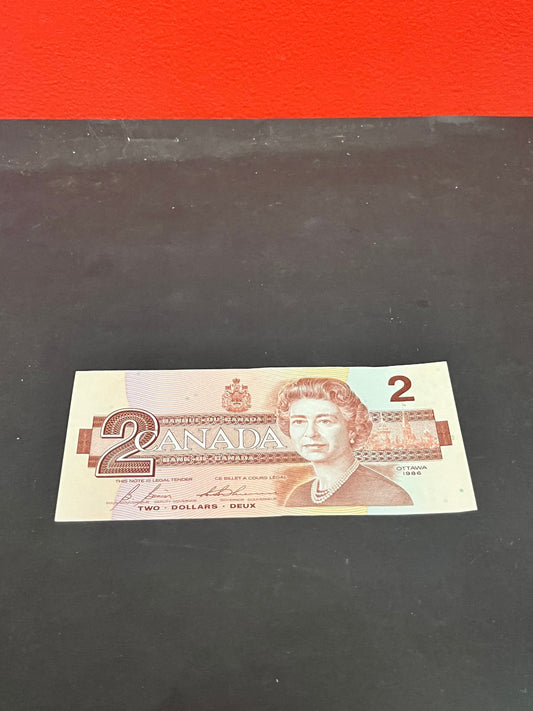 Bank issued mint condition Canadian 2 dollar bill