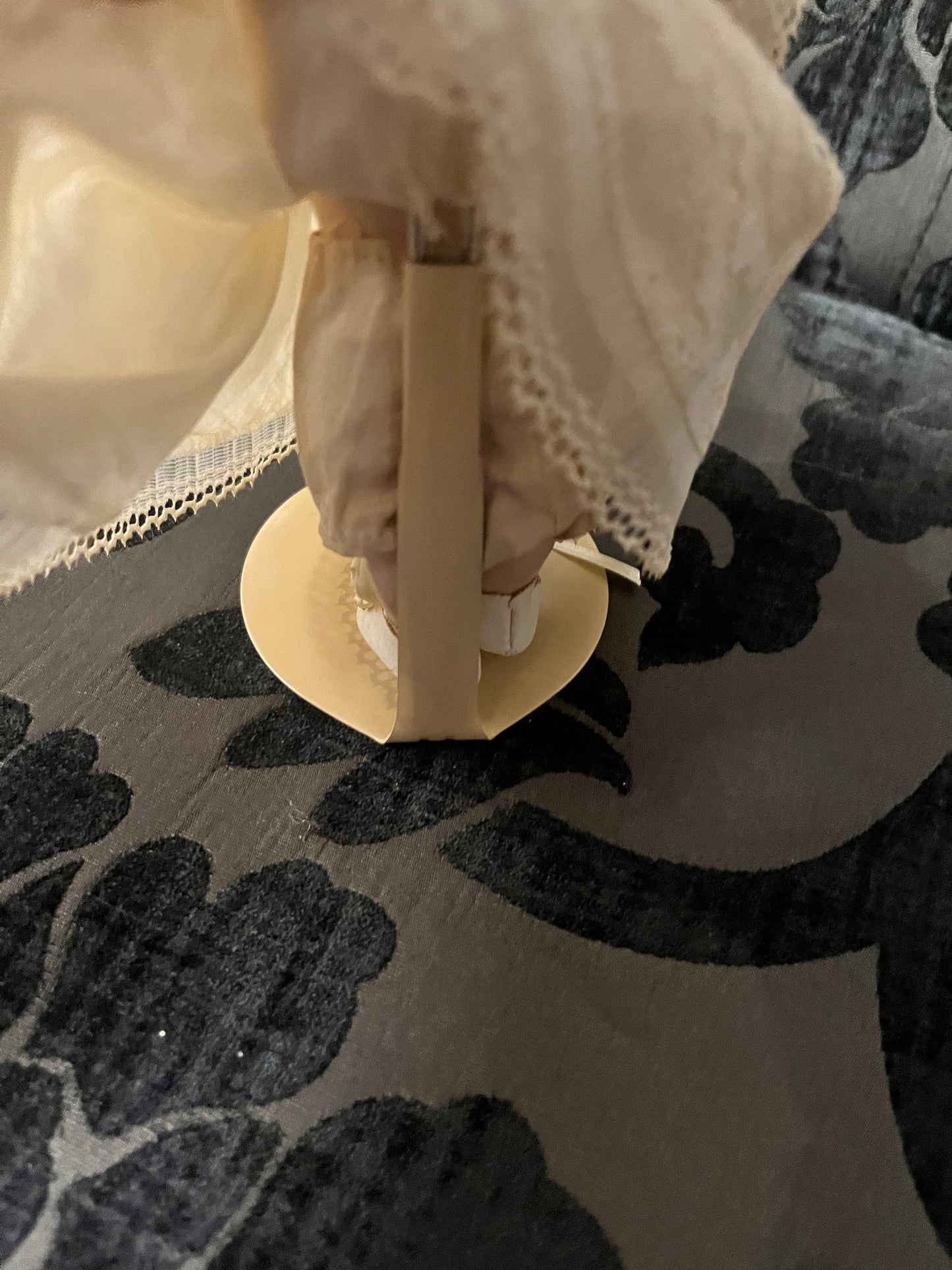 8 1/2 inch Victorian porcelain doll with original clothes on stand