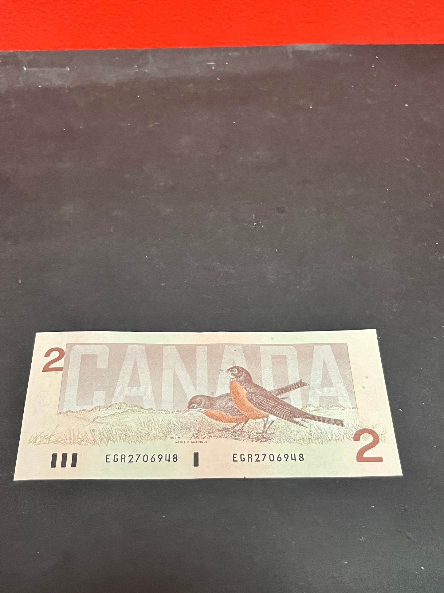 Bank issued mint condition Canadian 2 dollar bill