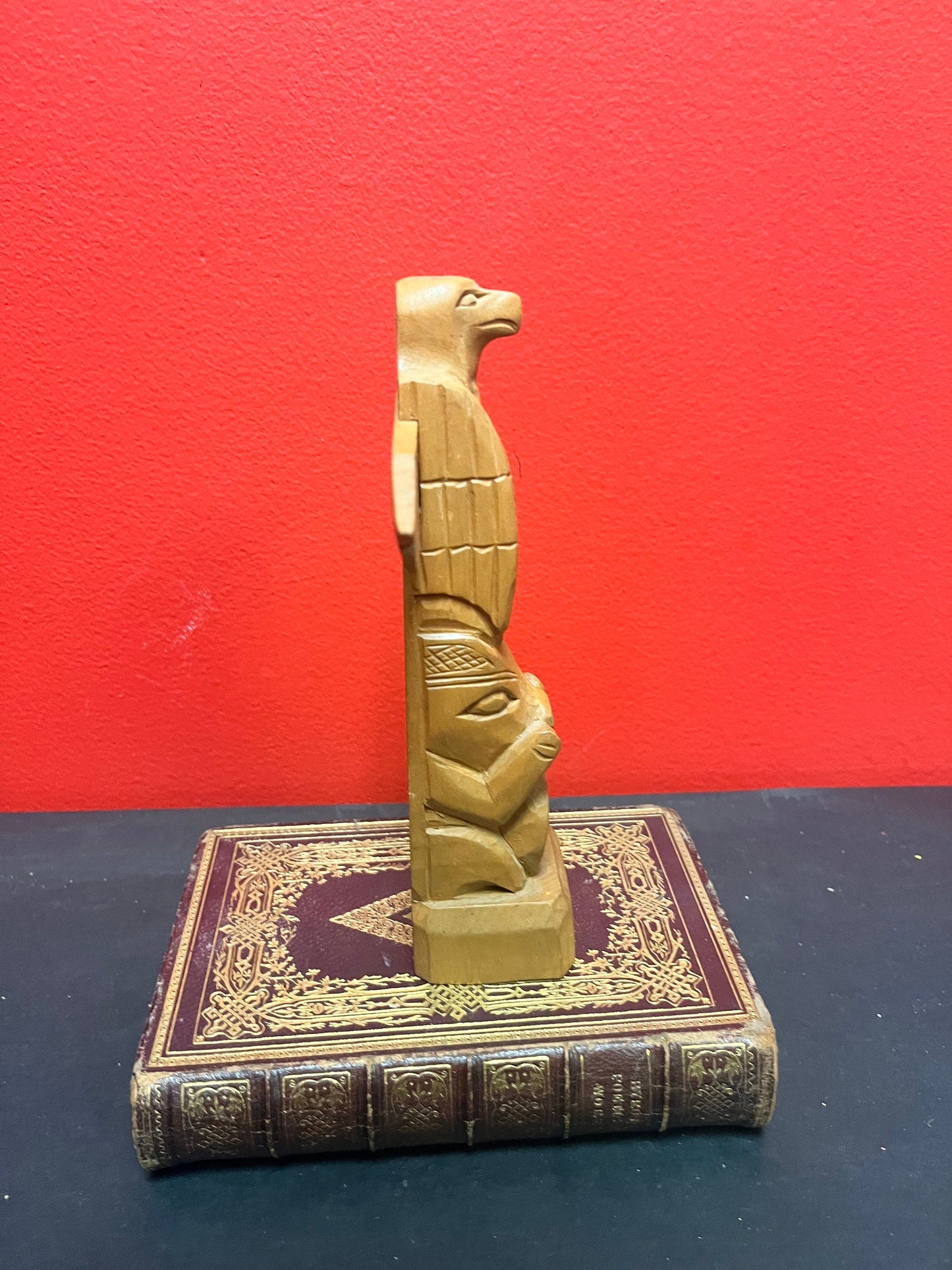A Lovely older 8 inch indigenous first nations pacific northwest coast cedar eagle to bear transformation totem pole great detail