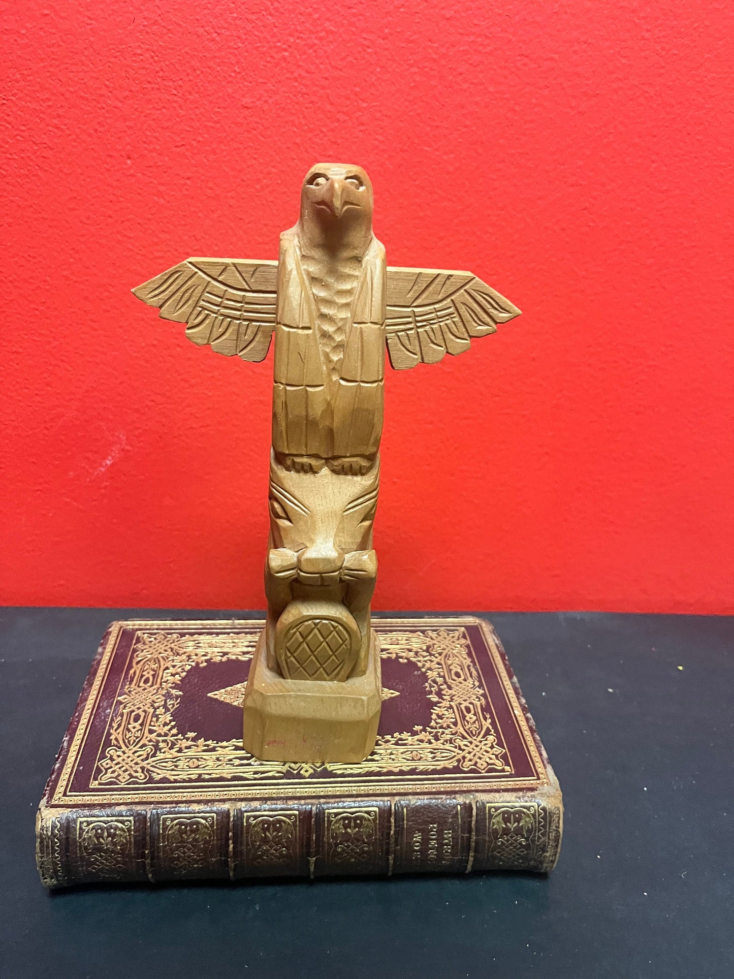 A Lovely older 8 inch indigenous first nations pacific northwest coast cedar eagle to bear transformation totem pole great detail
